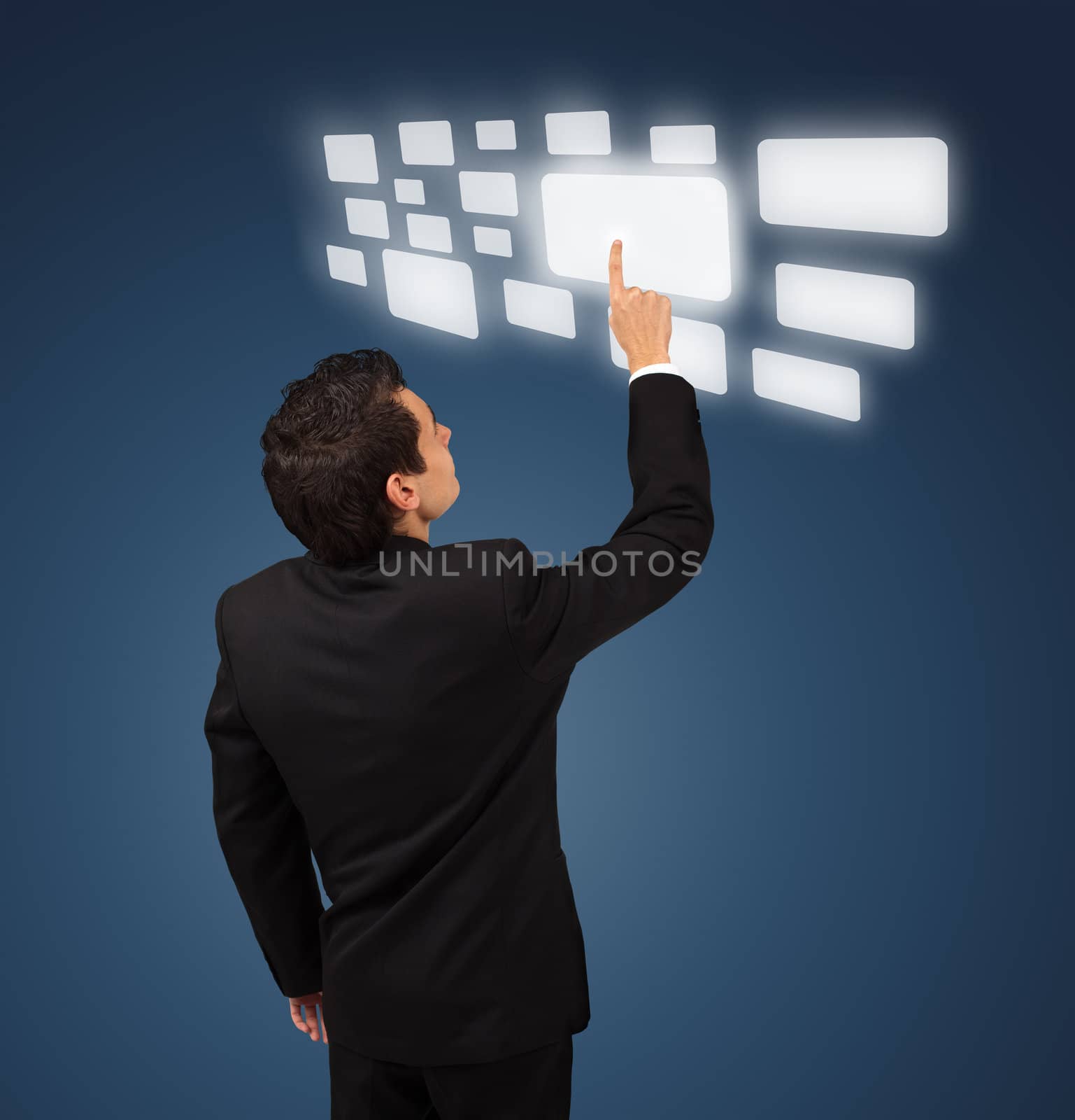 Business man pressing a touchscreen button