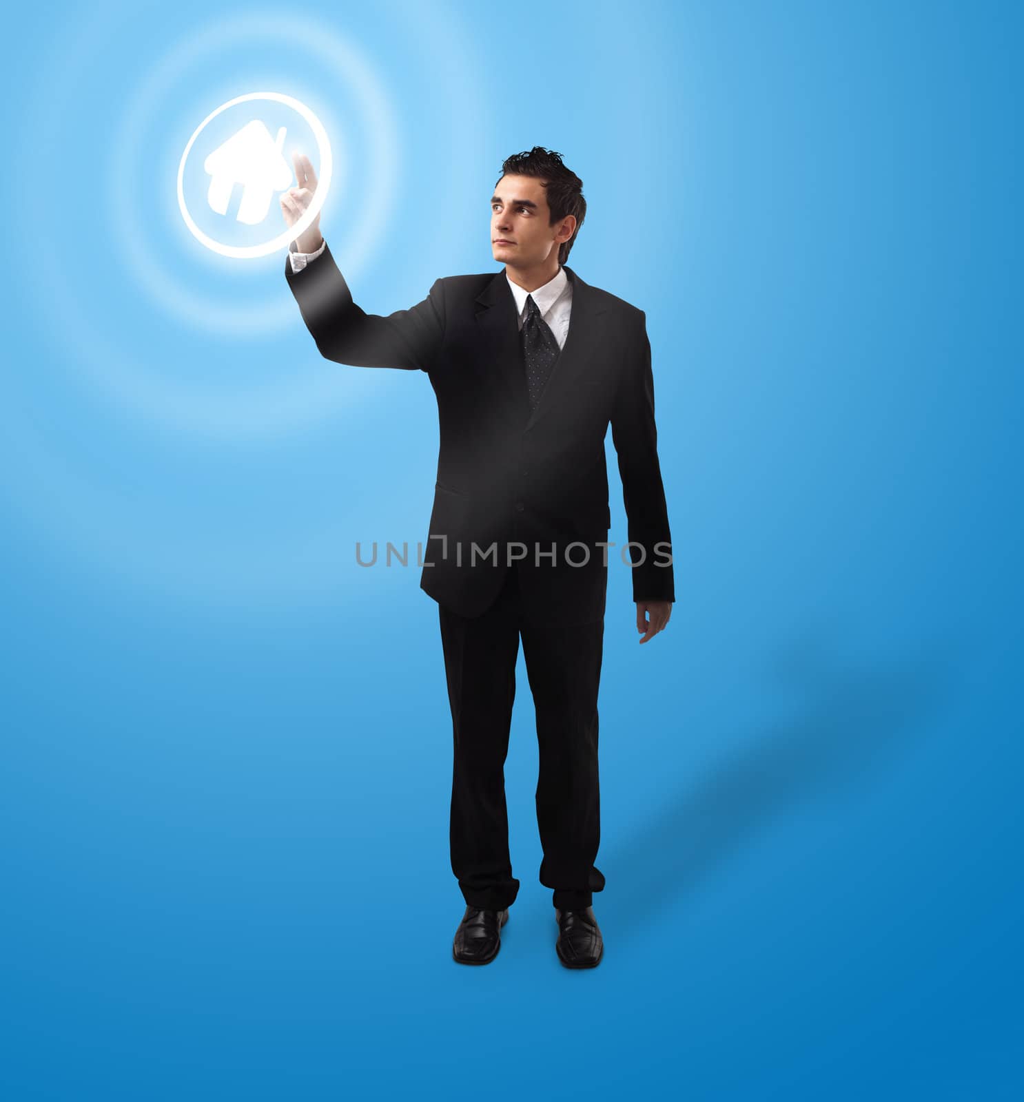 business man pressing HOME button, futuristic digital technology