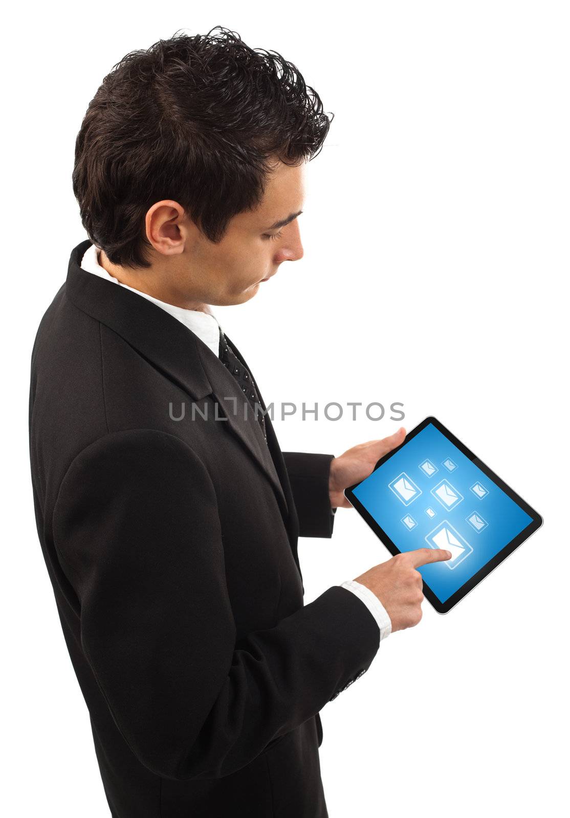 Businessman holding a touchpad pc, one finger touches e-mail symbol, isolated on white 