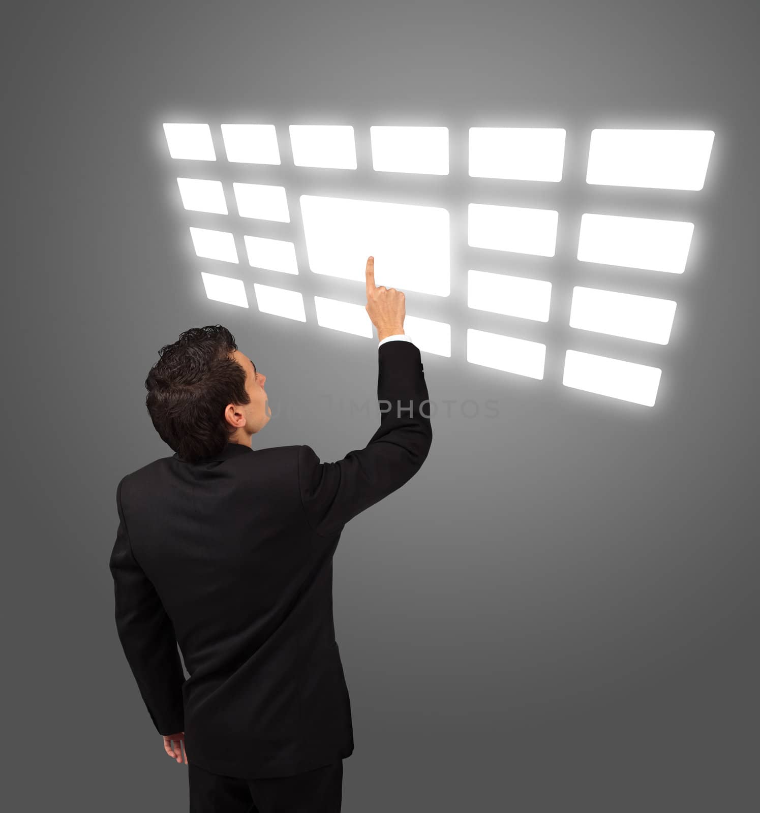 business man pressing touchscreen button 