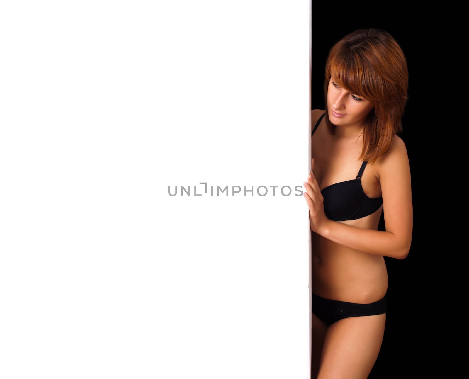 sexy girl holding a billboard add