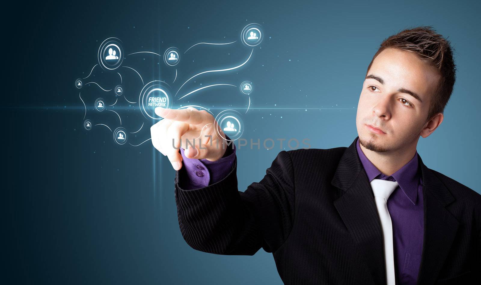 Businessman pressing modern social buttons on a virtual background