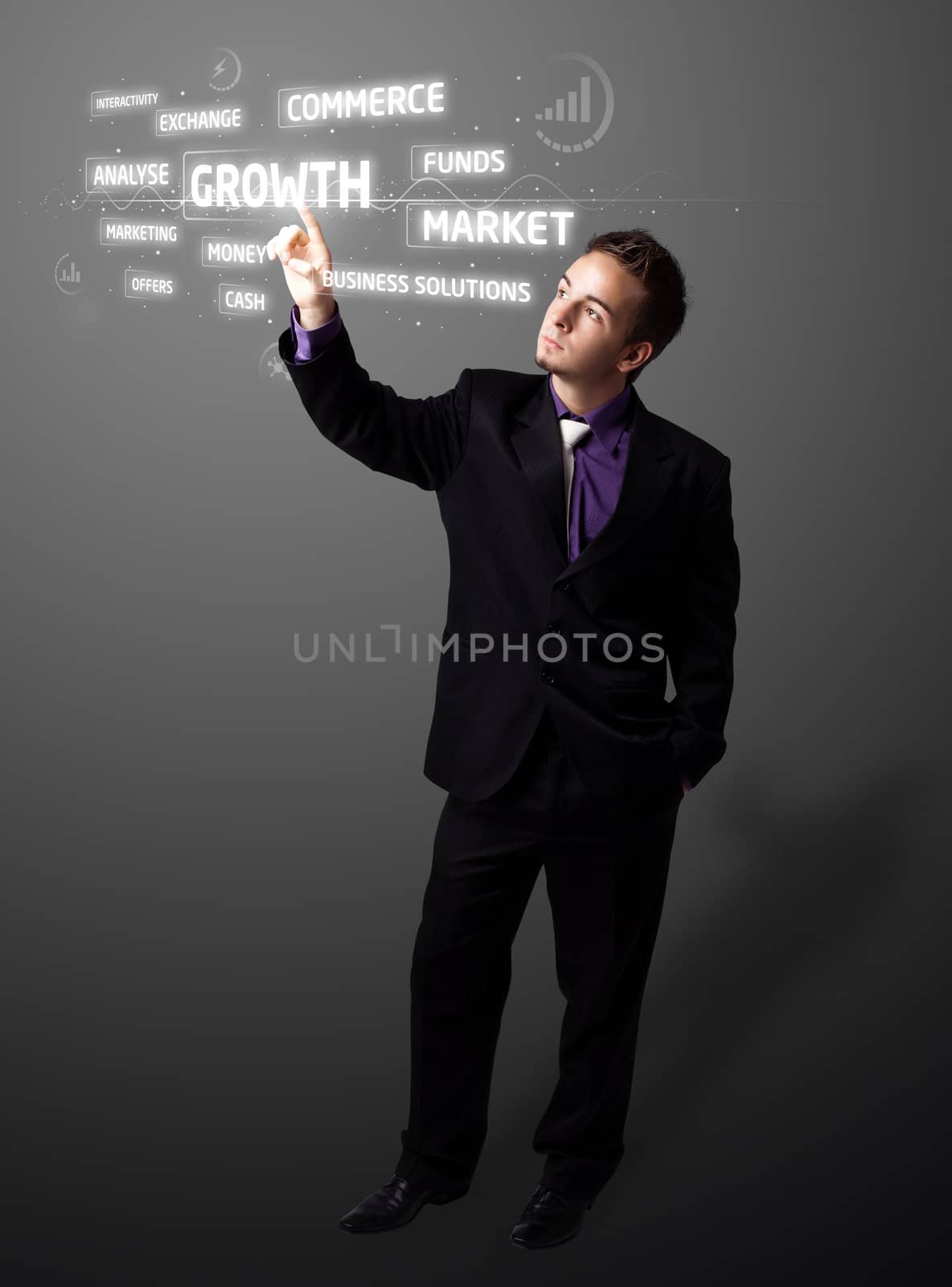 Businessman pressing business type of modern buttons with virtual background