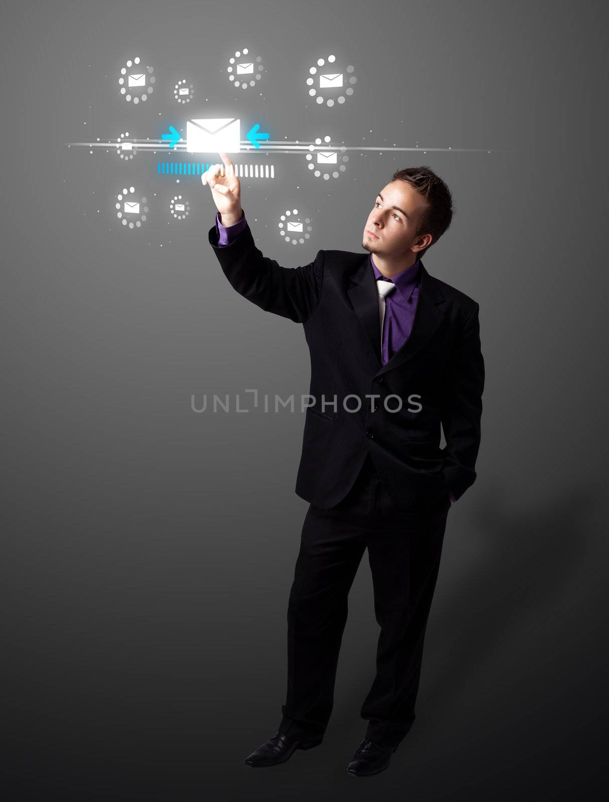 Businessman pressing messaging type of modern icons with virtual background