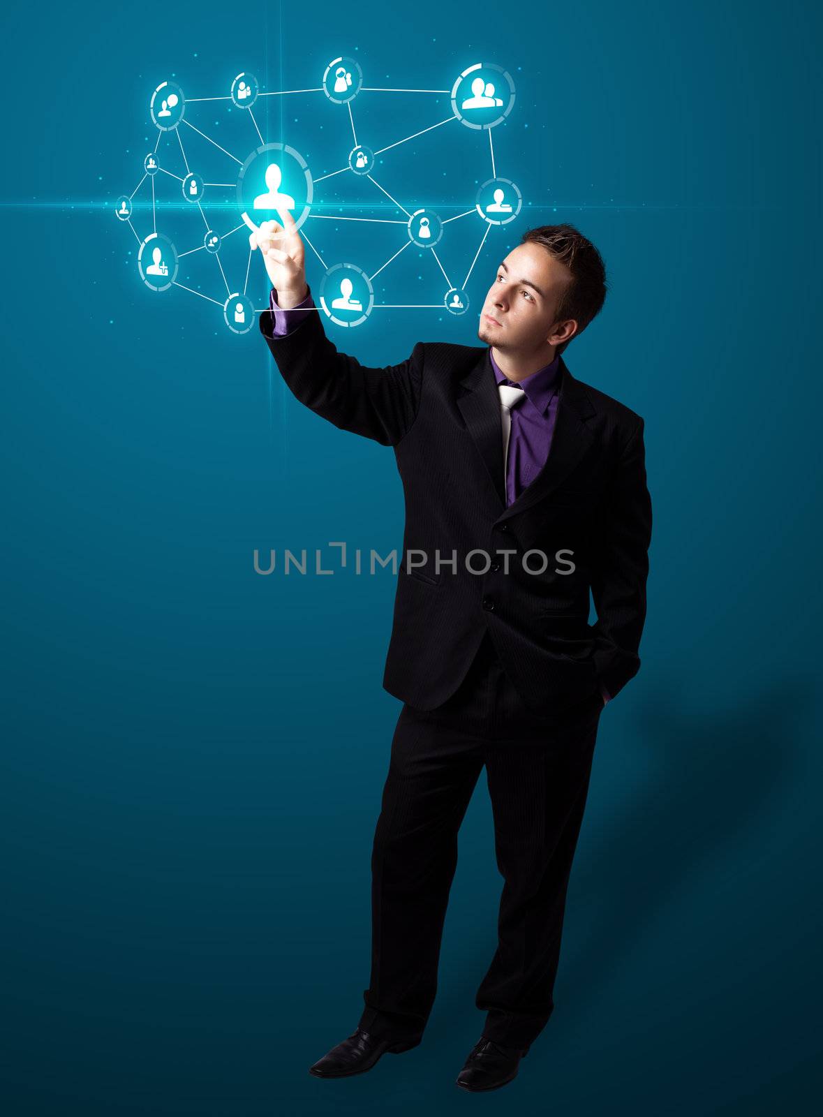 Businessman pressing modern social buttons on a virtual background