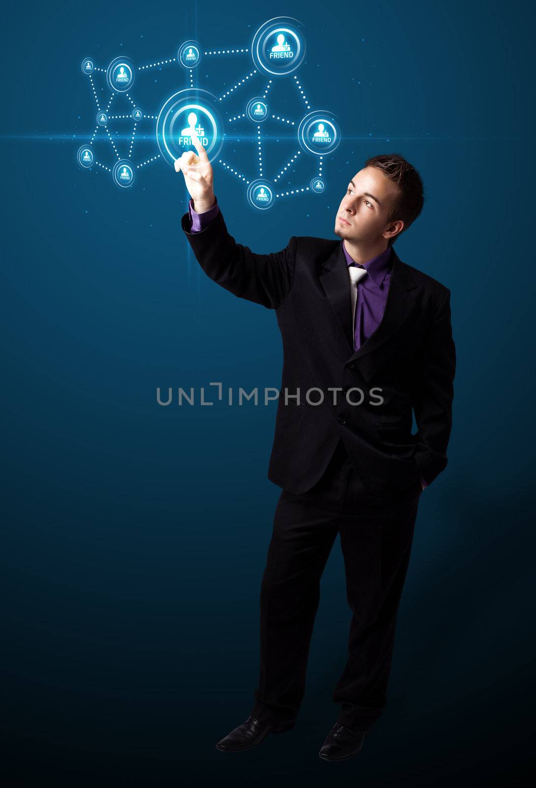 Businessman pressing modern social buttons on a virtual background