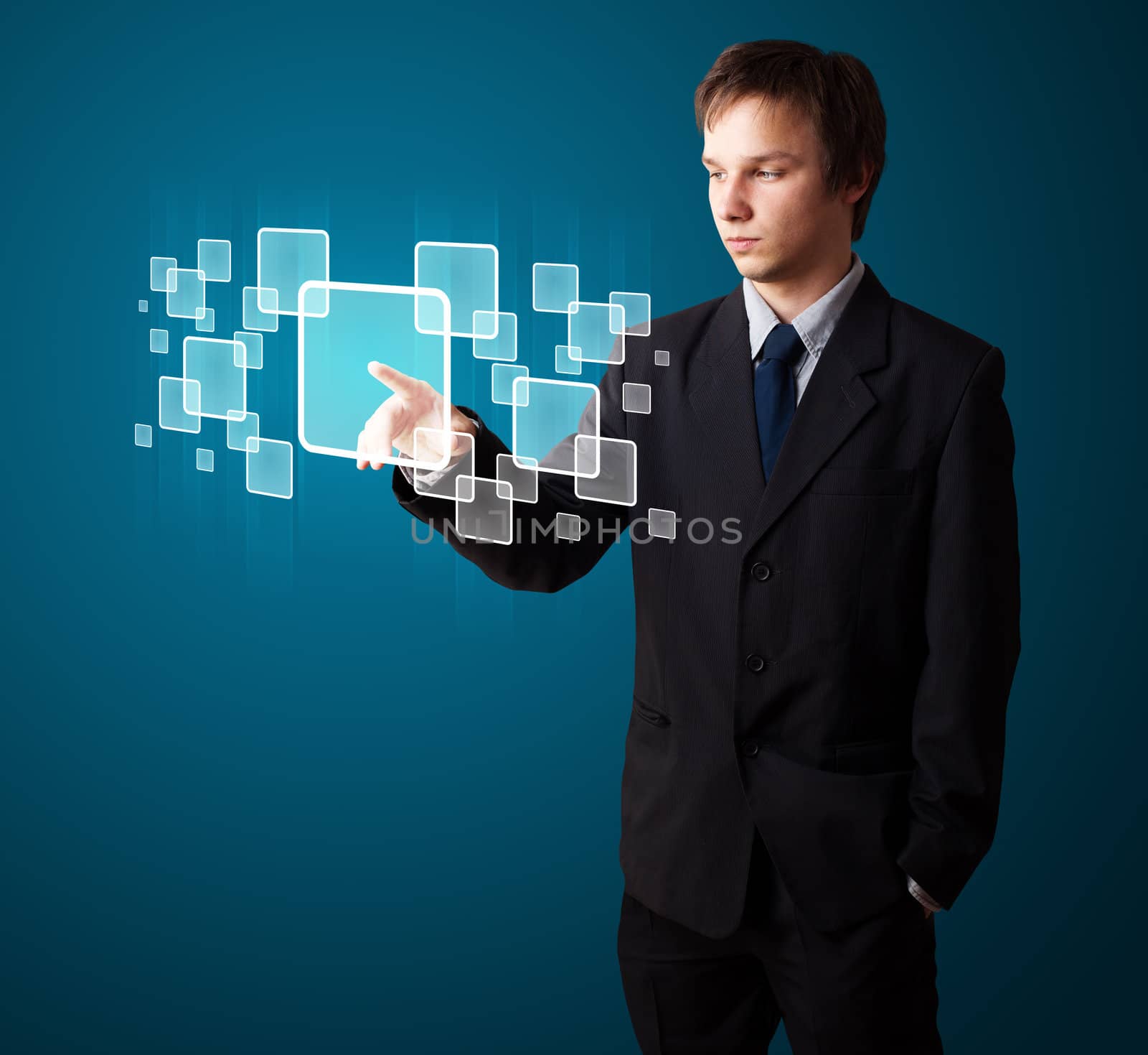 Businessman pressing high tech type of modern buttons on a virtual background