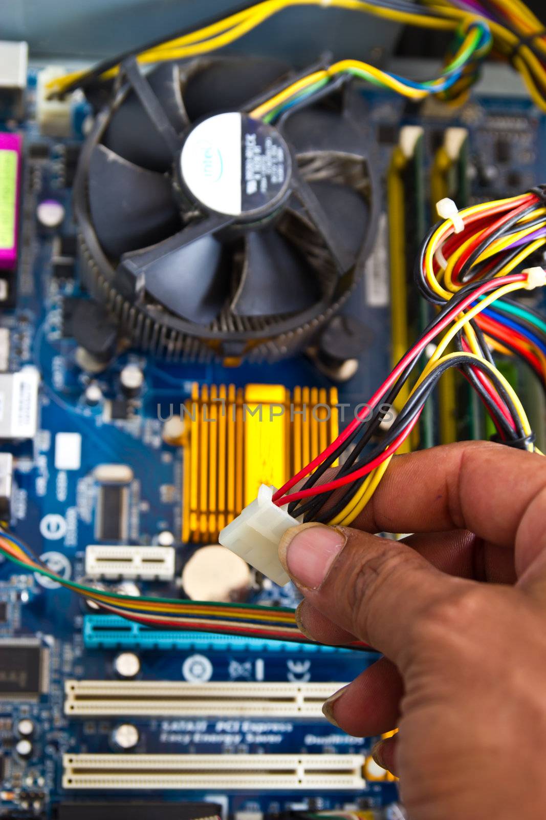 Technician repairing computer hardware in the lab