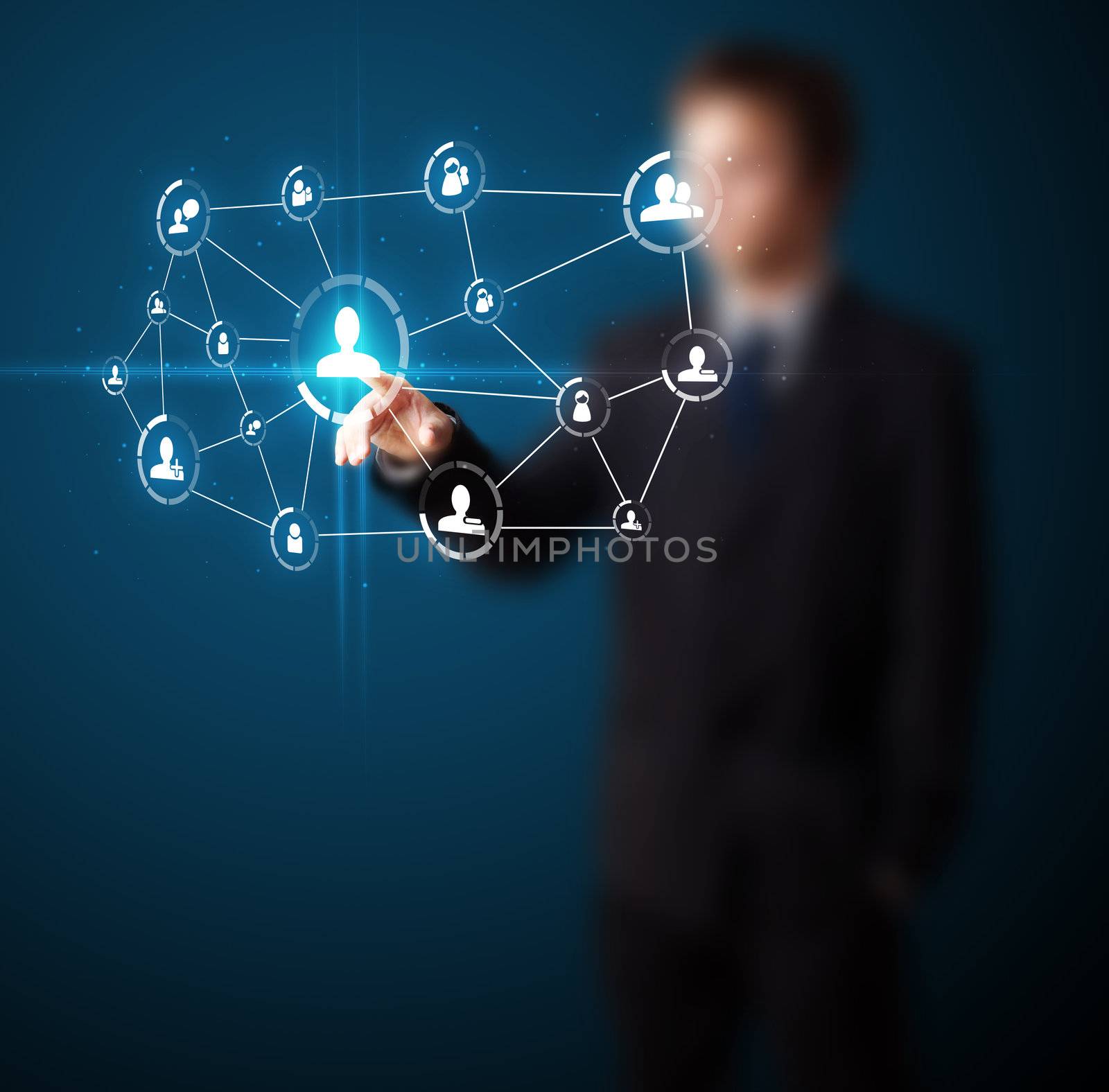 Businessman pressing modern social buttons on a virtual background