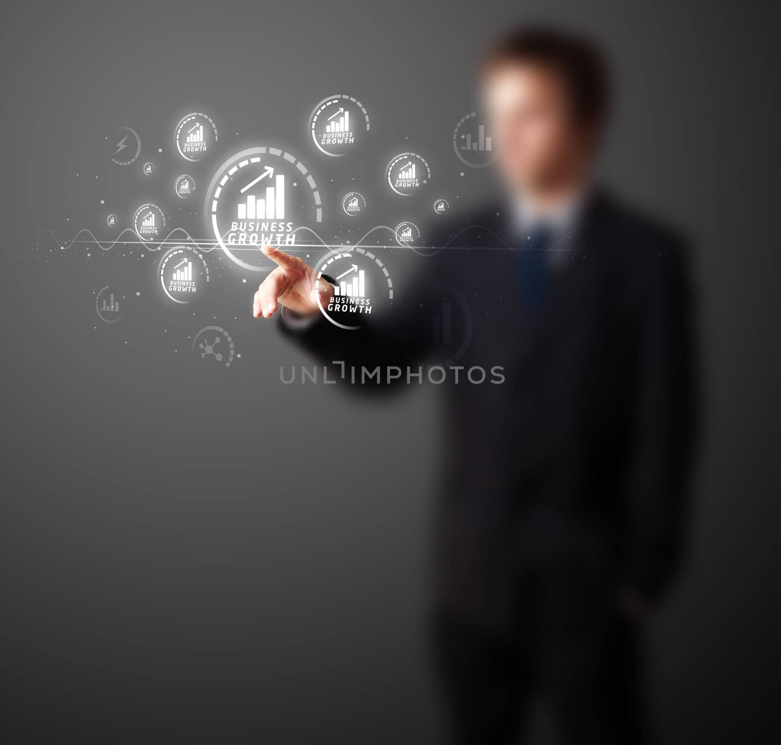 Businessman pressing business type of modern buttons with virtual background