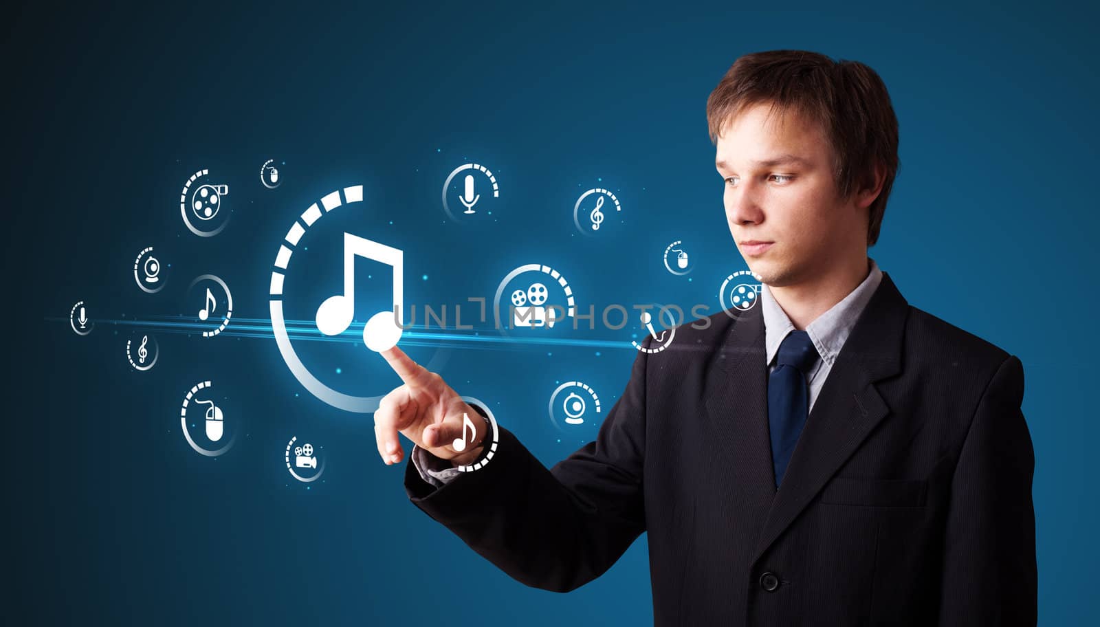 Businessman pressing multimedia type of modern buttons with virtual background