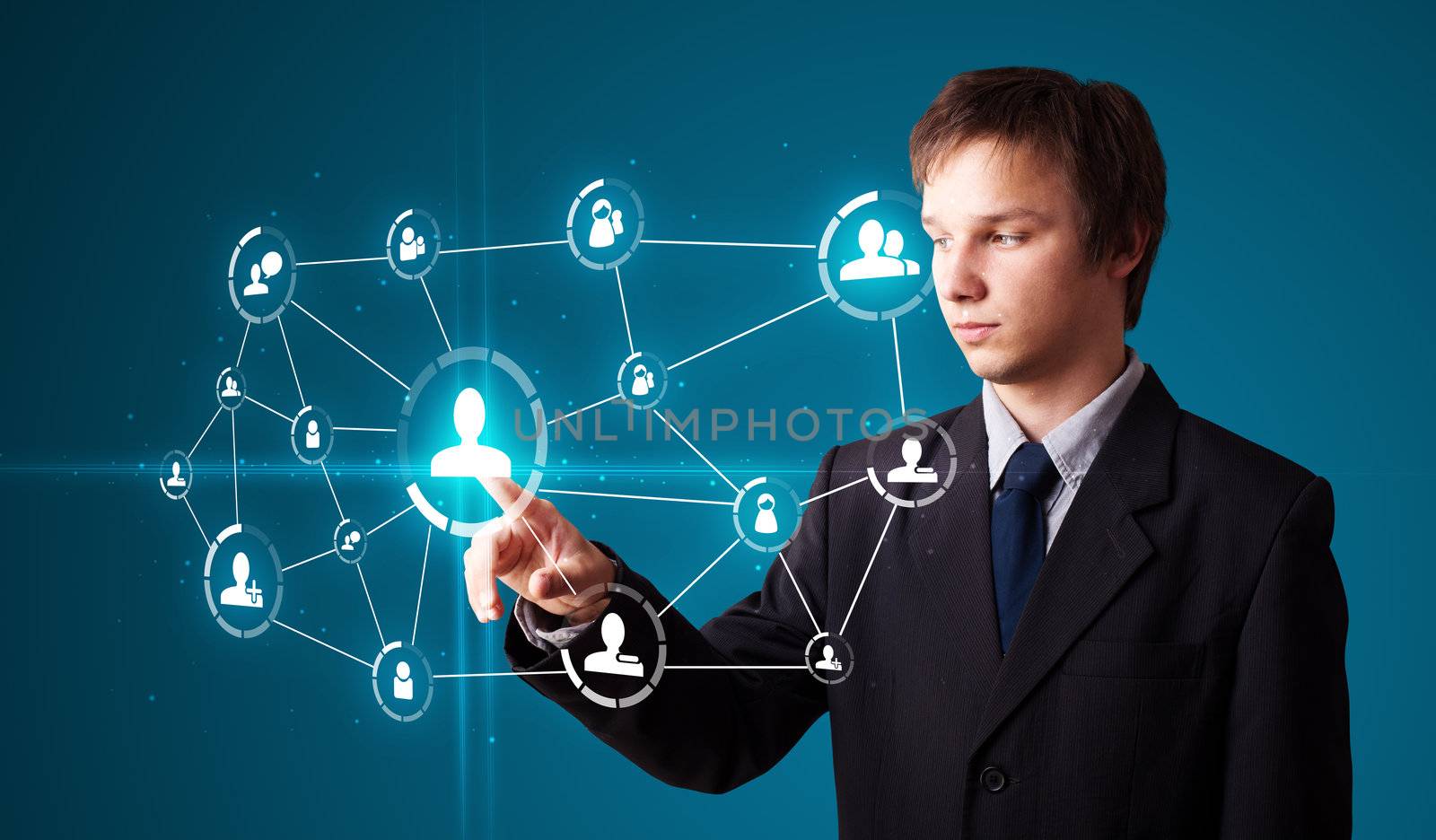 Businessman pressing modern social buttons on a virtual background