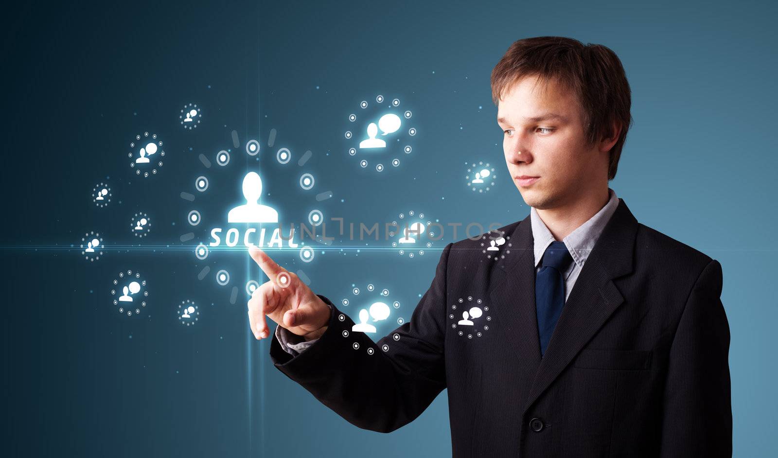 Businessman pressing modern social buttons on a virtual background