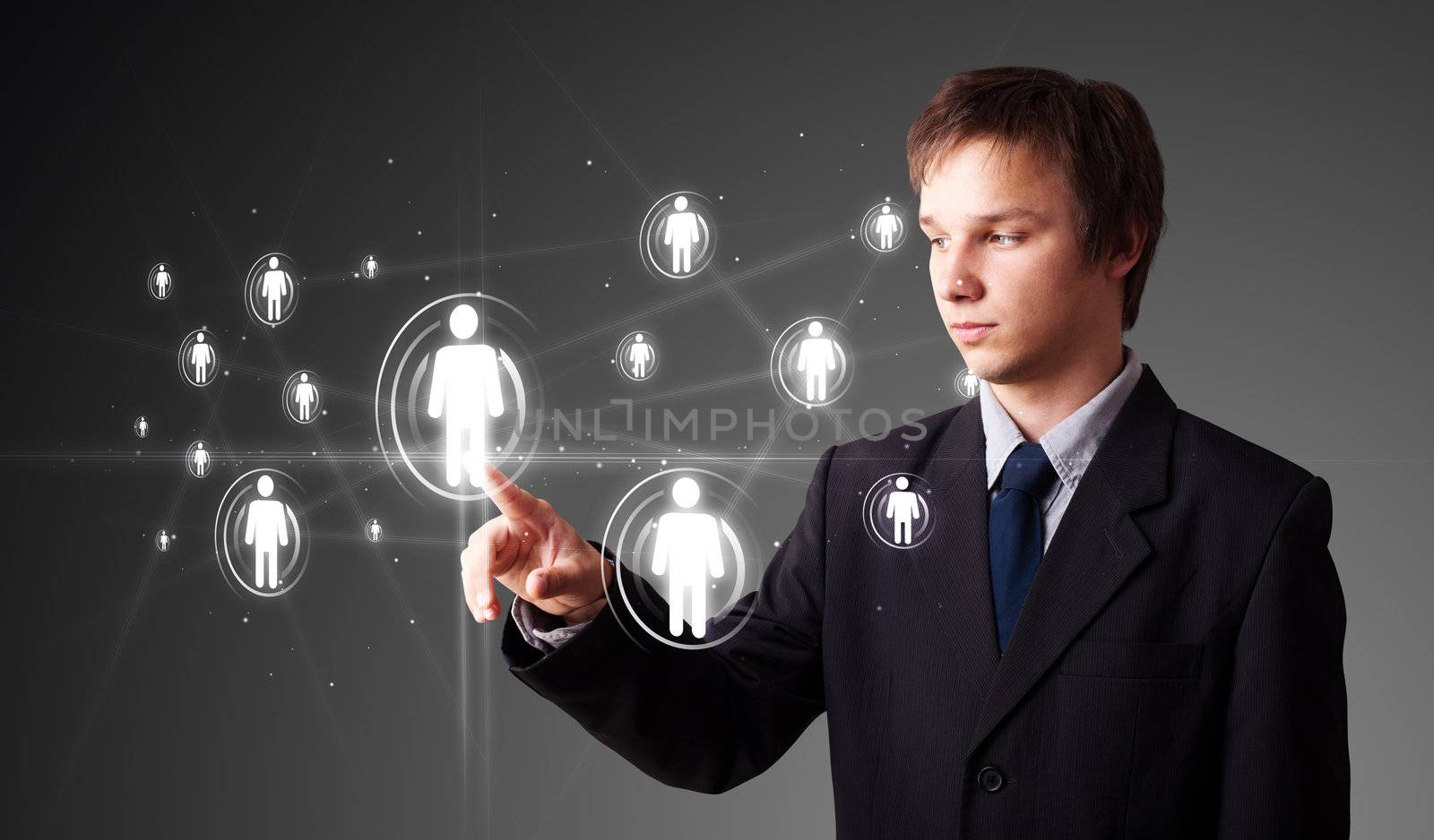 Businessman pressing modern social buttons on a virtual background