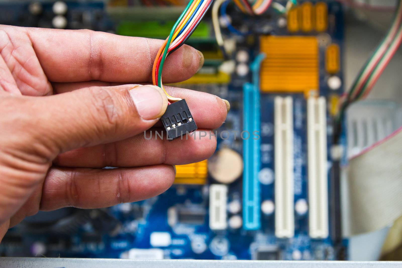 Technician repairing computer hardware in the lab by wasan_gredpree