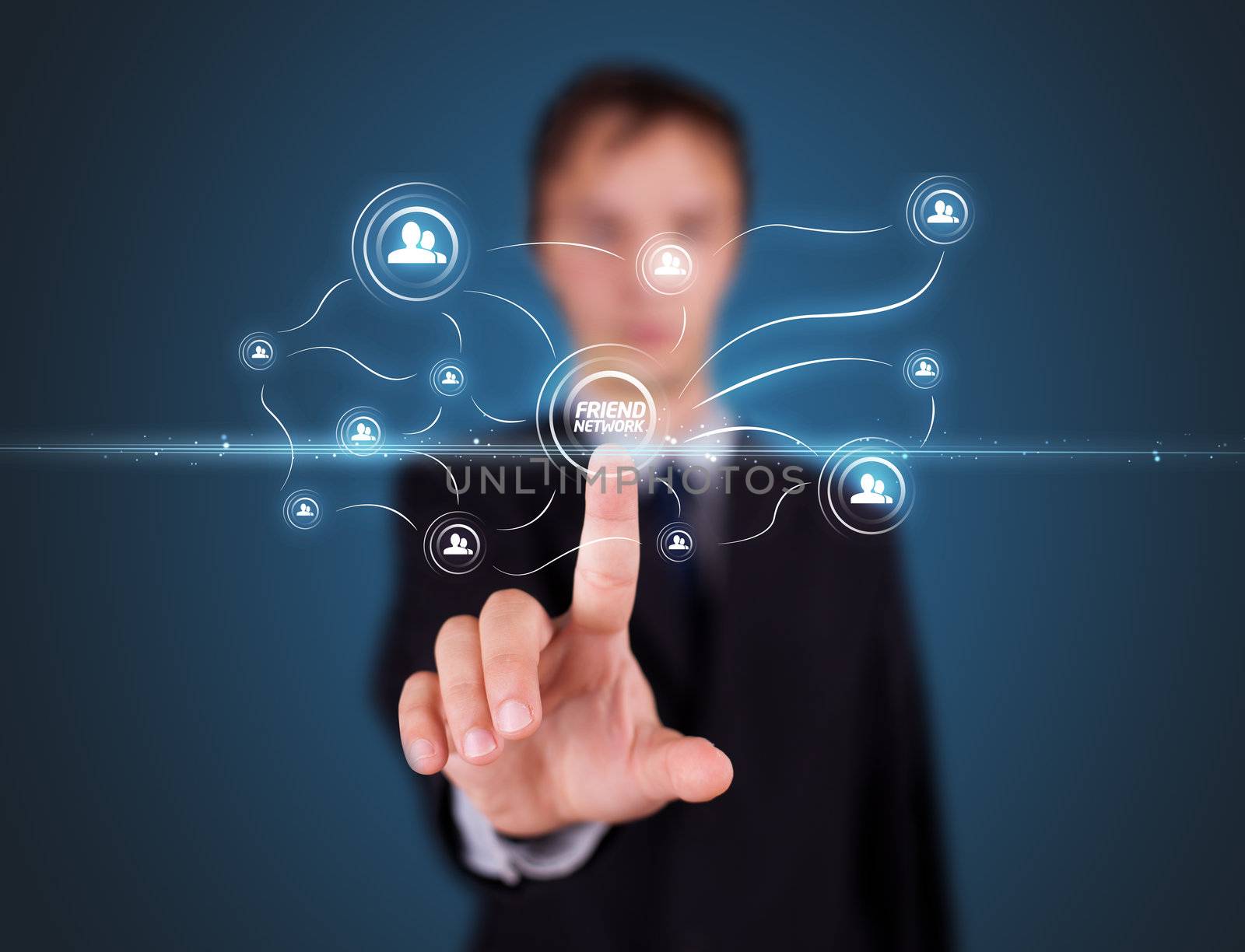 Businessman pressing modern social buttons on a virtual background