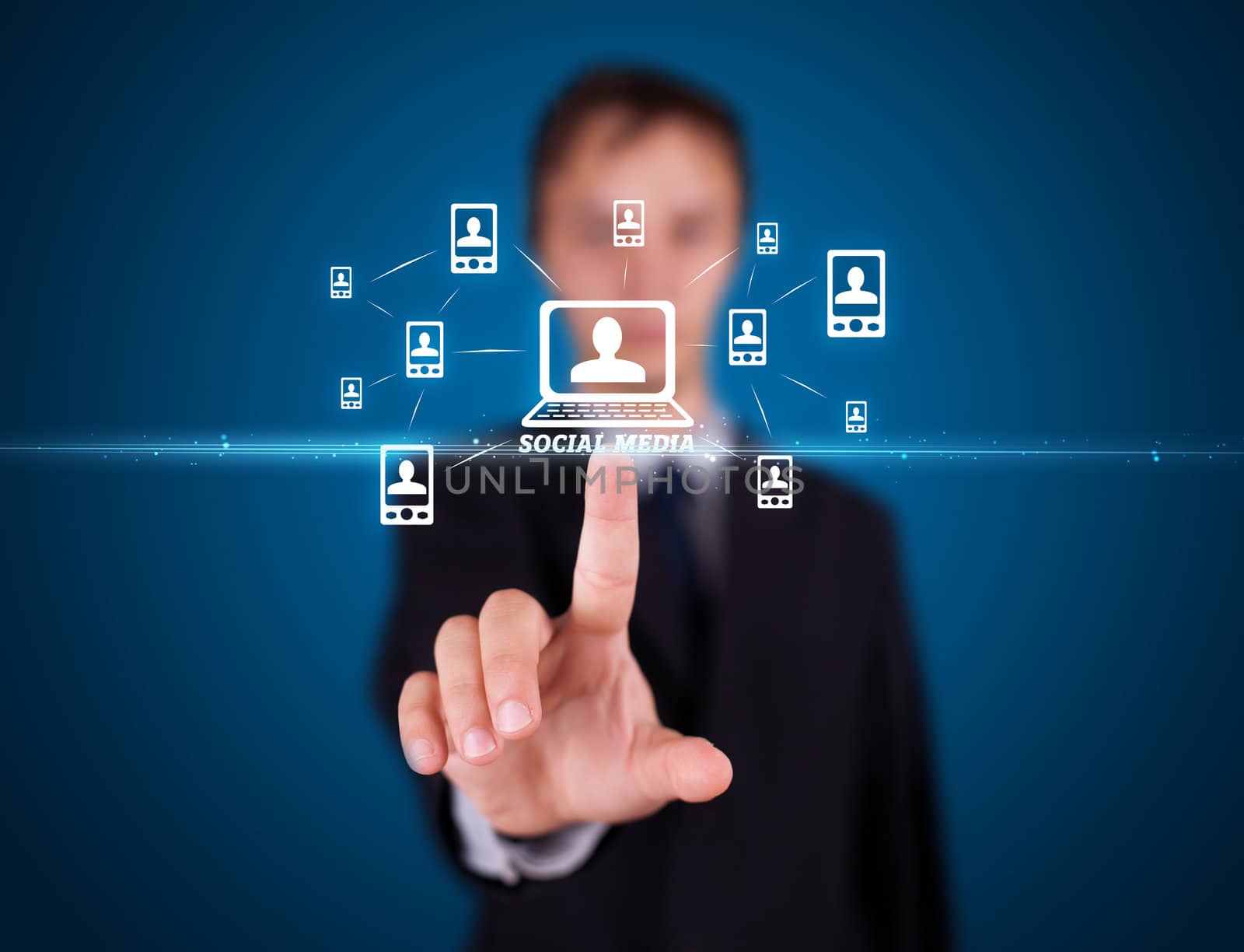 Businessman pressing modern social buttons on a virtual background