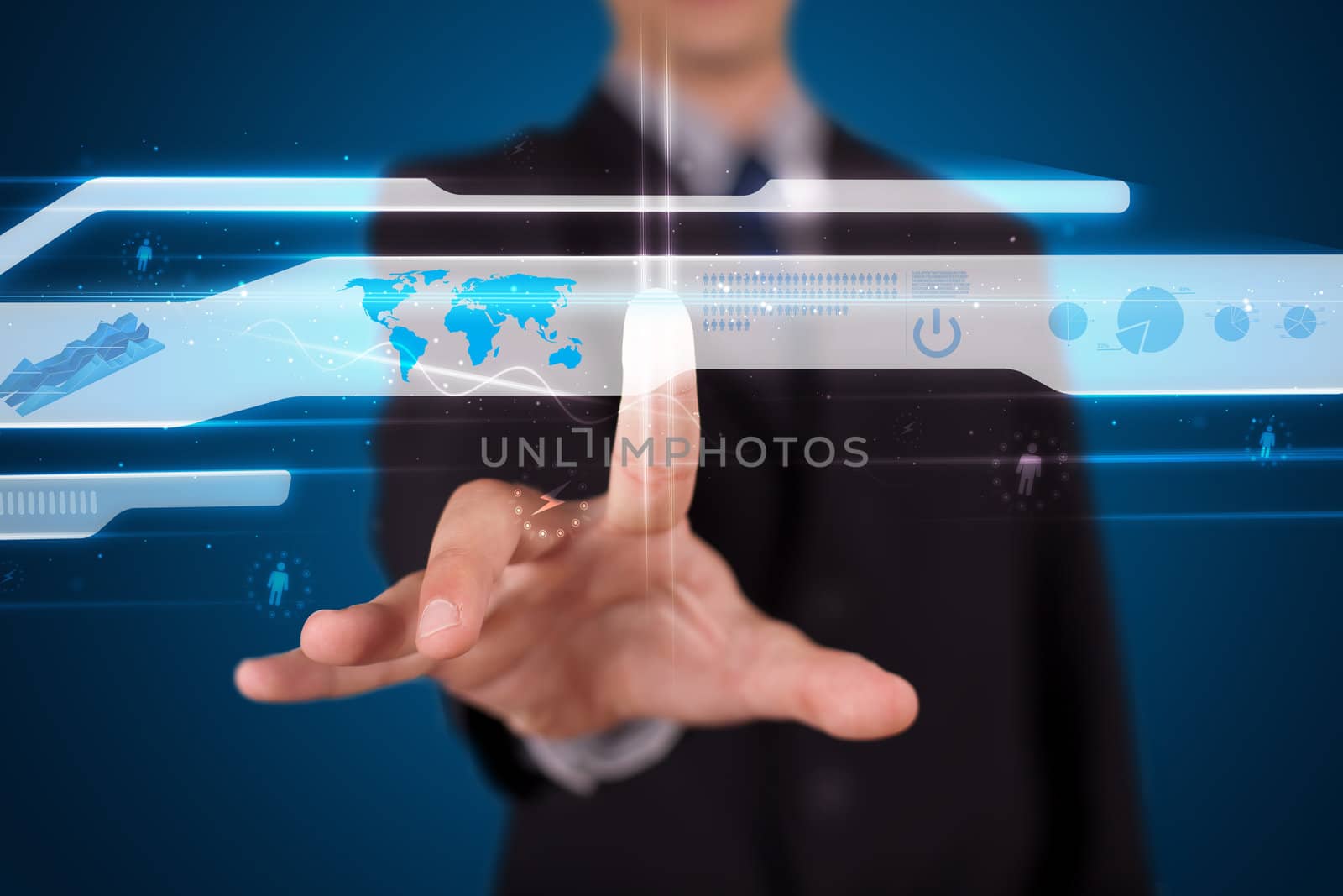 Businessman pressing high tech type of modern buttons on a virtual background