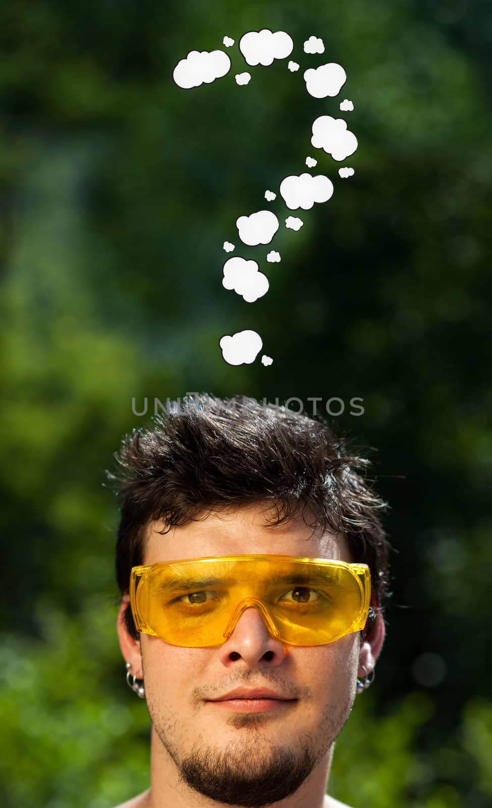 Young persons head looking with gesture at writing marks