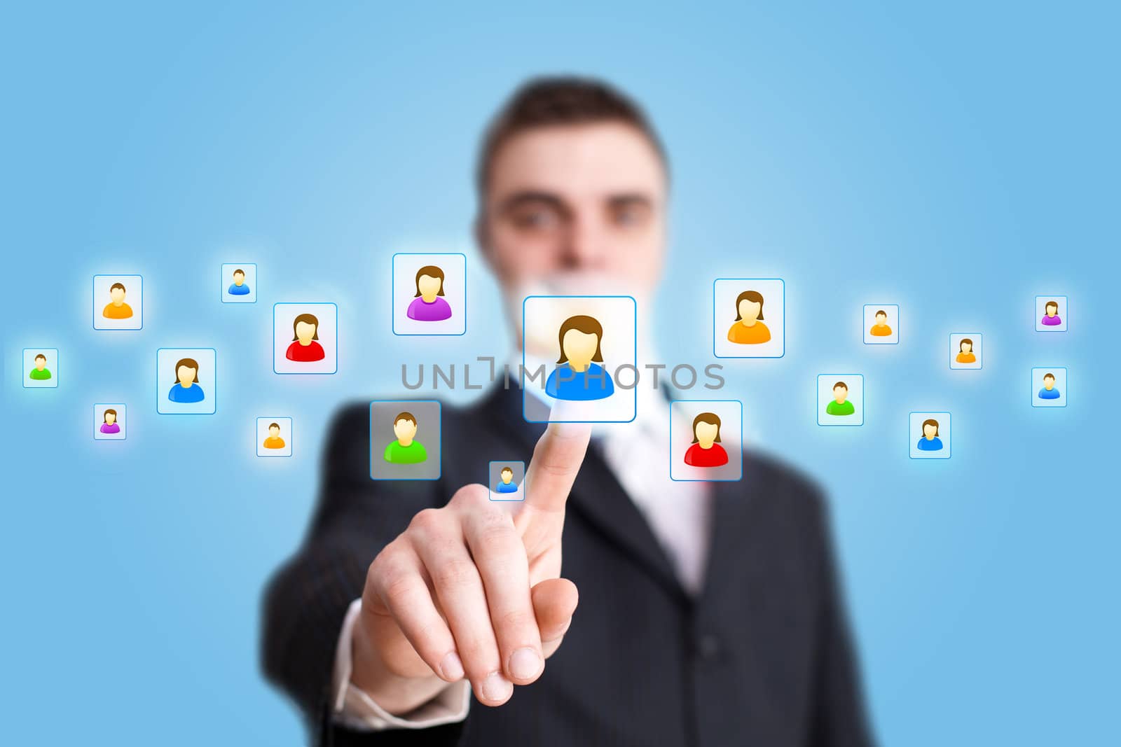 Businessman hand pressing Social network icon