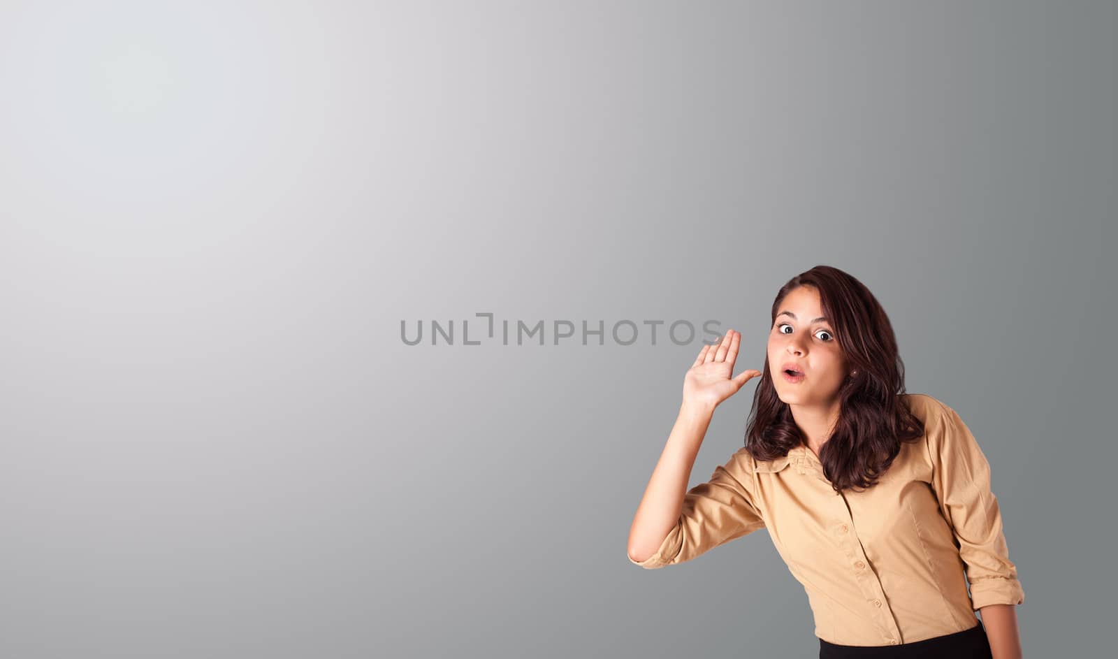 pretty young woman gesturing with copy space