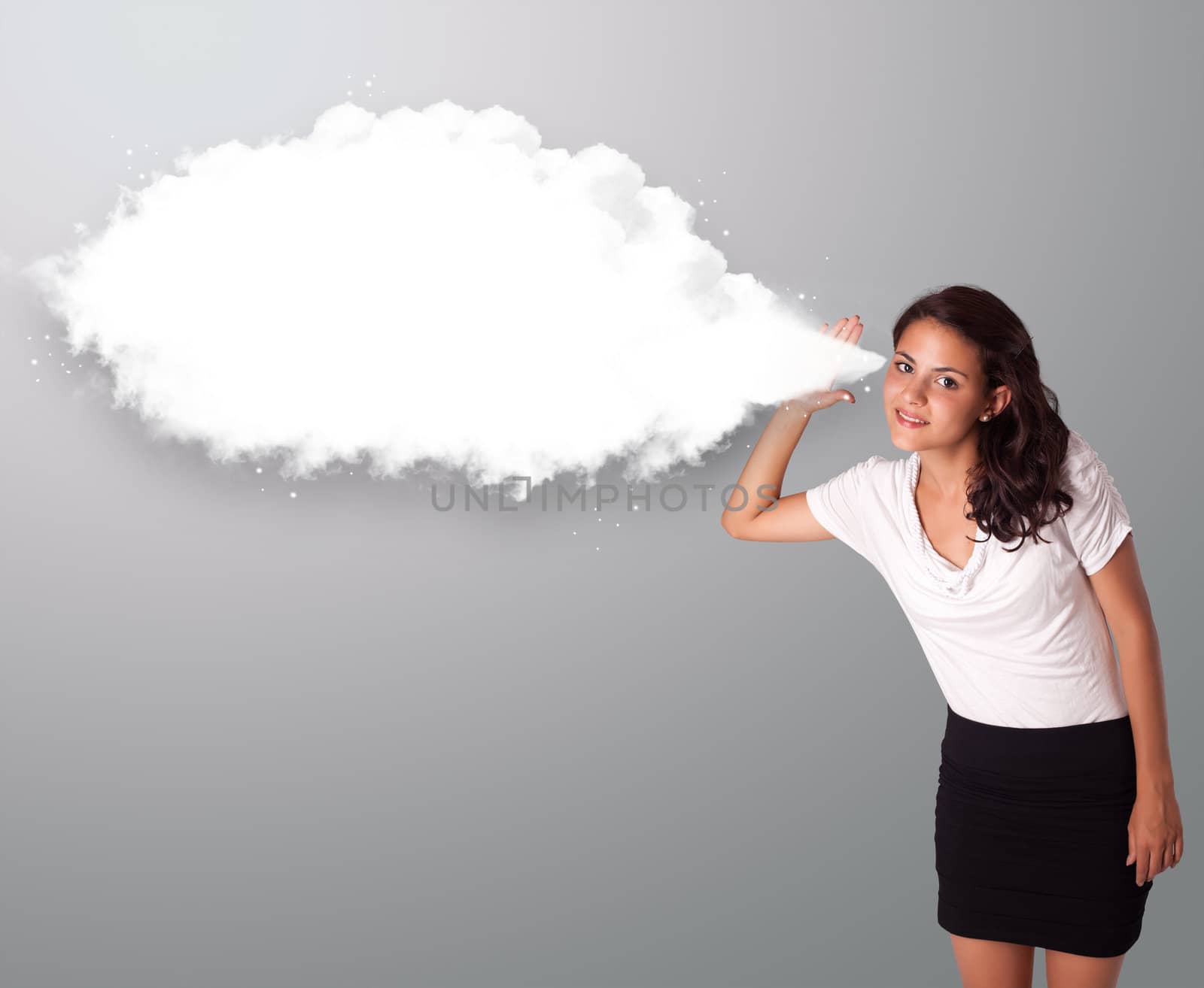 Pretty young woman gesturing with abstract cloud copy space