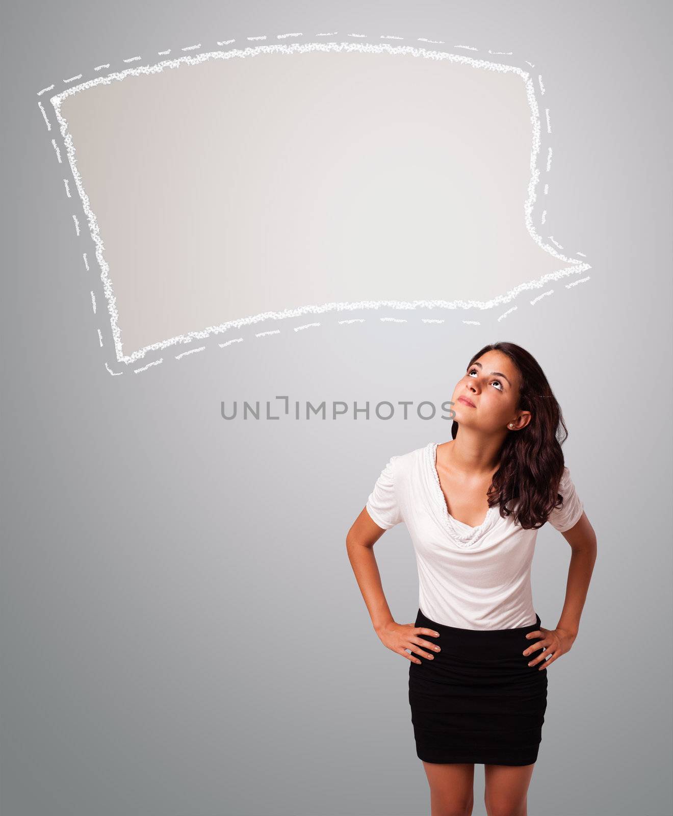 Attractive woman looking abstract speech bubble copy space by ra2studio