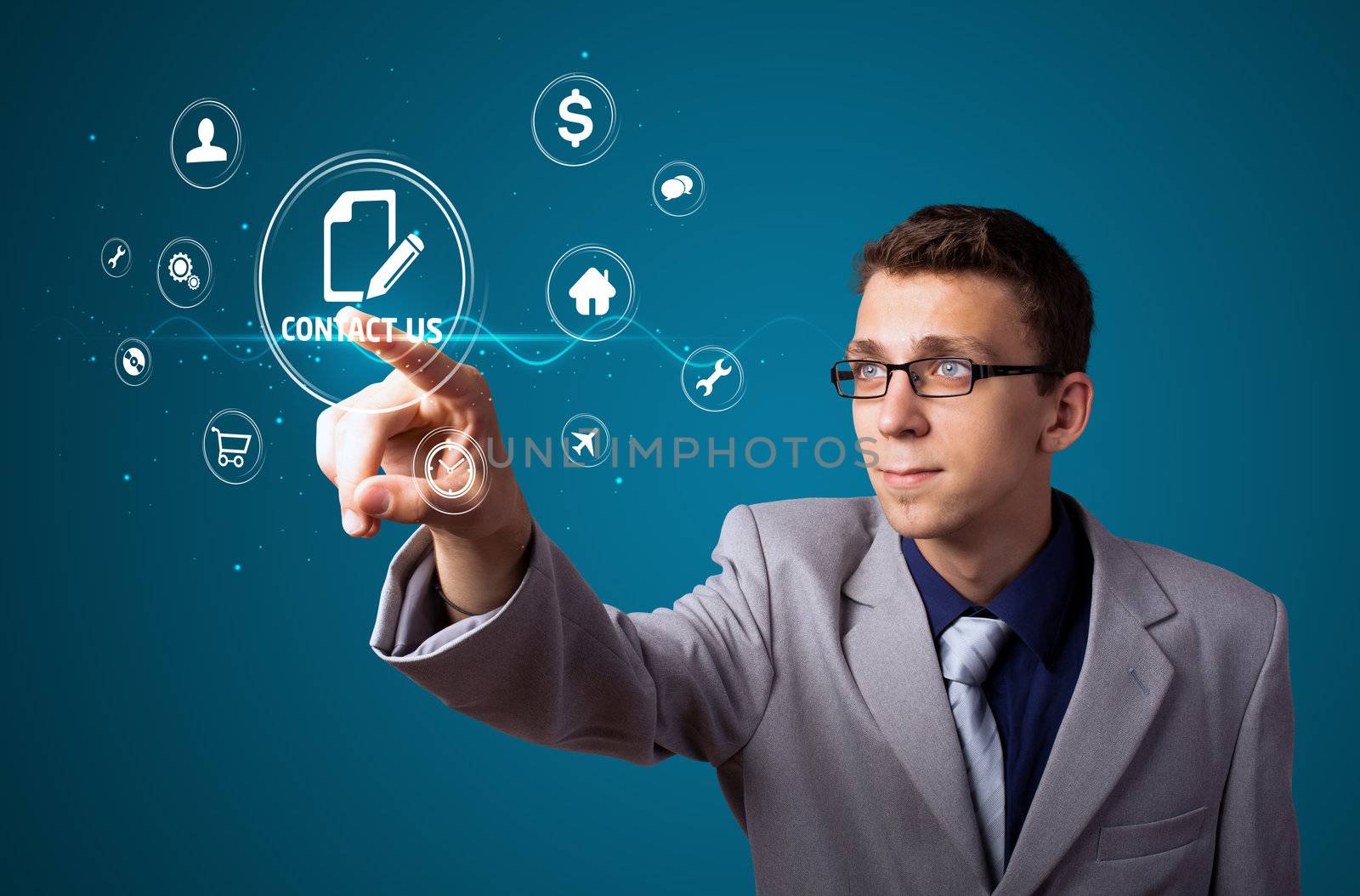 Businessman pressing messaging type of modern icons with virtual background