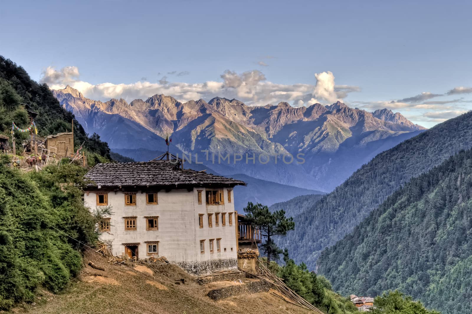 Tibetan House With Mountains in Background by JamesWheeler