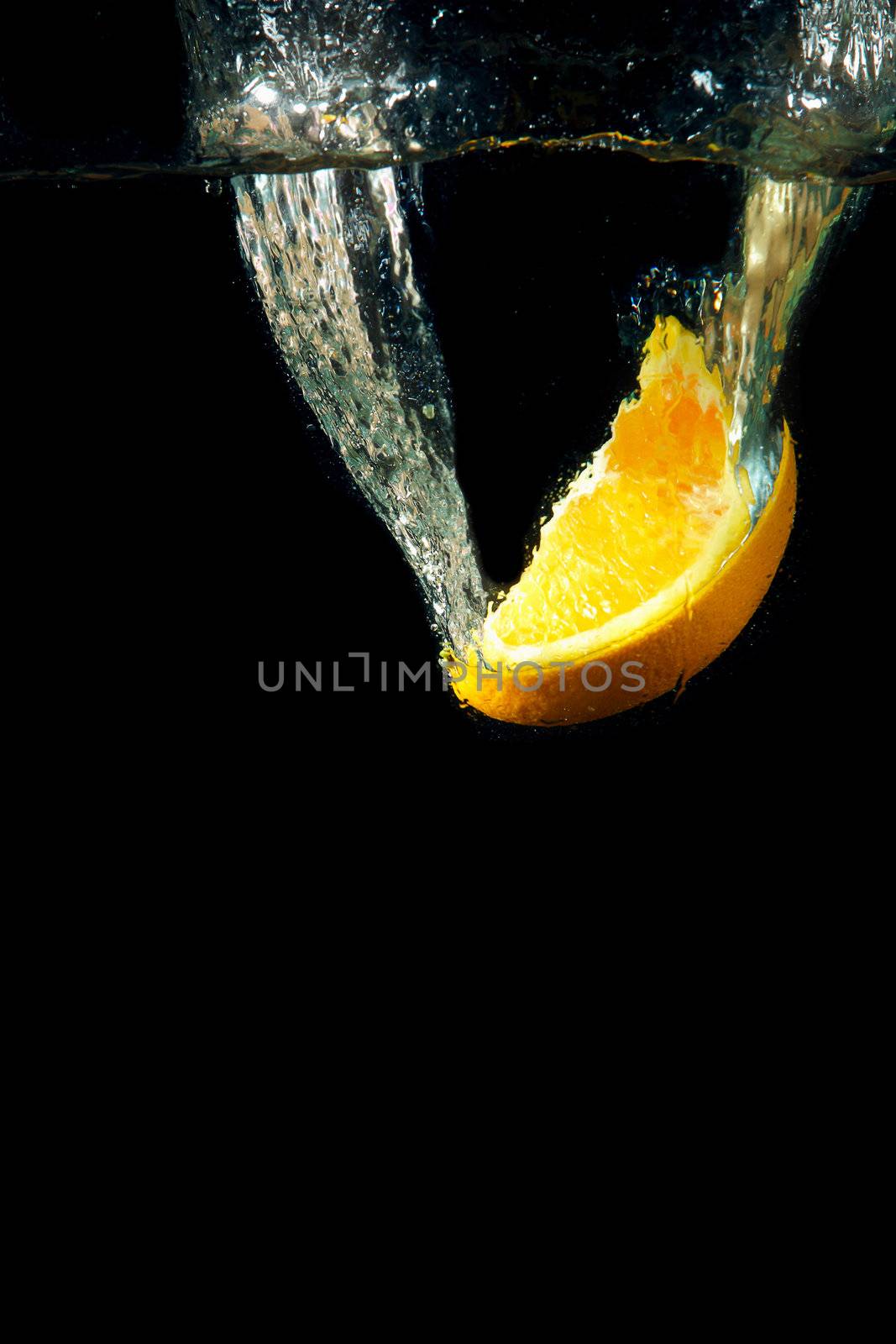 Bright and juicy lemon under water. Fresh and healthy meal