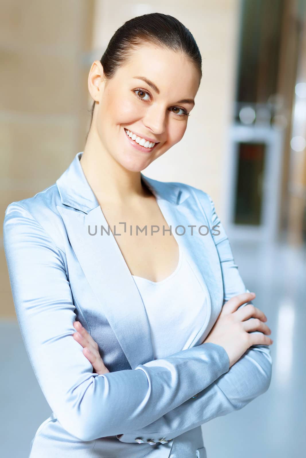 portrait of a confident young businesswoman by sergey_nivens