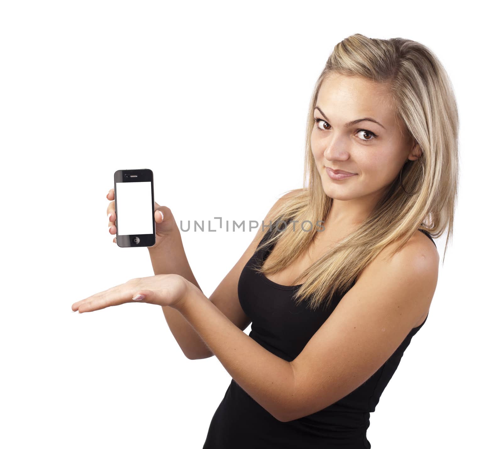 Young girl holding smartphone in her hand, isolated on white