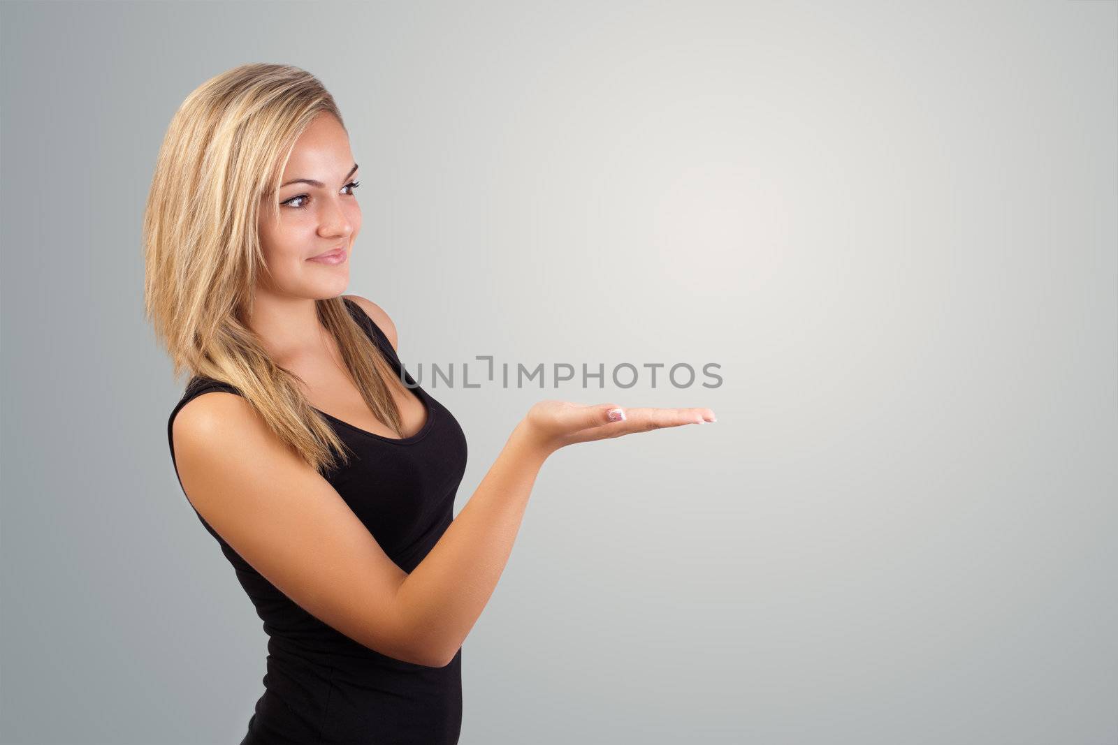blonde woman presenting hand, copyspace on right