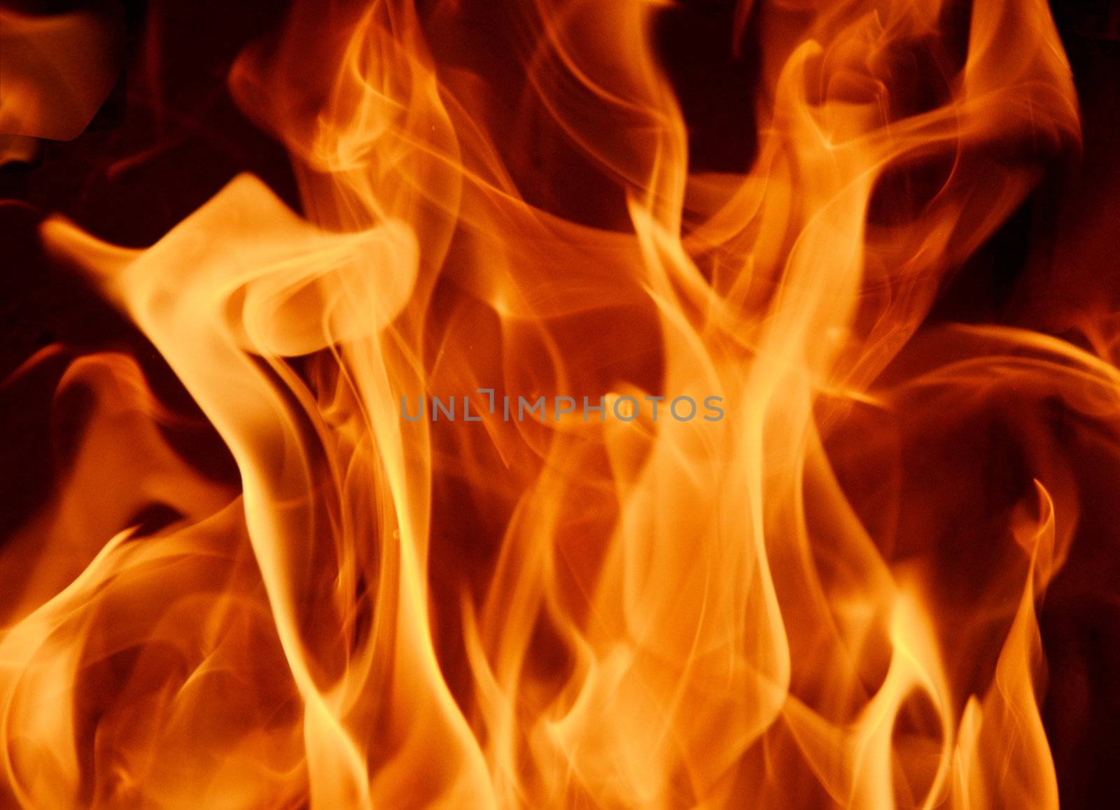Abstract background / backdrop representing fire. flame pattern with dark and light spots. Can be used as a wallpaper