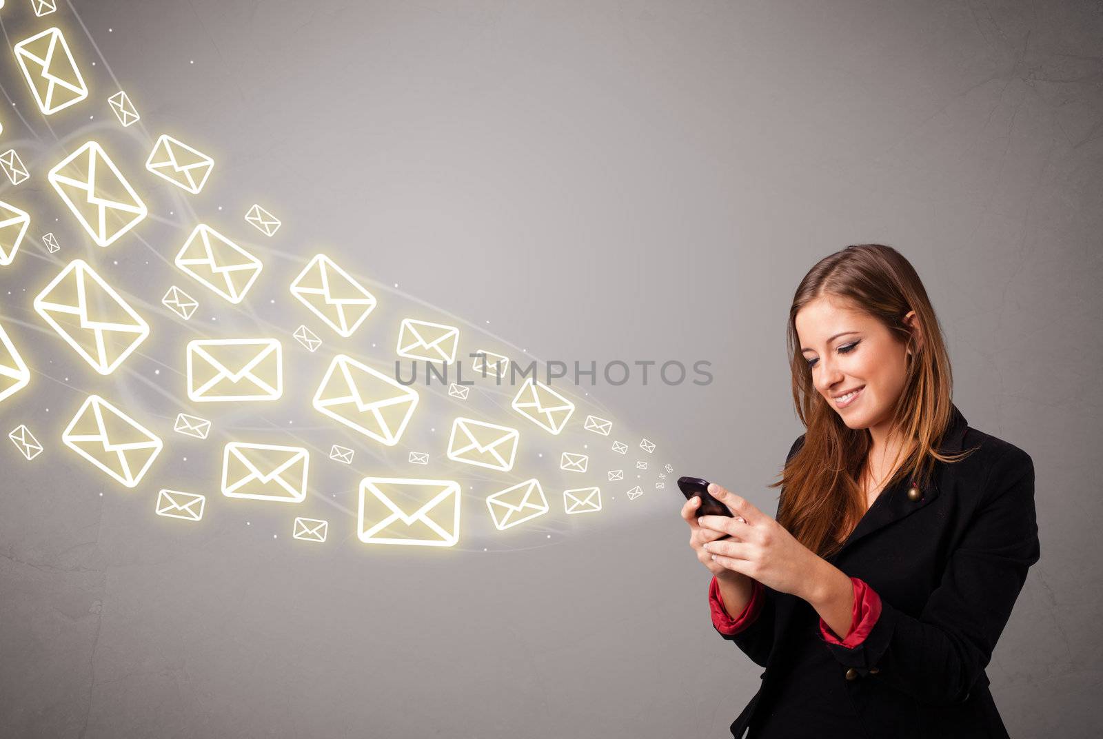attractive young lady standing and holding a phone with message icons