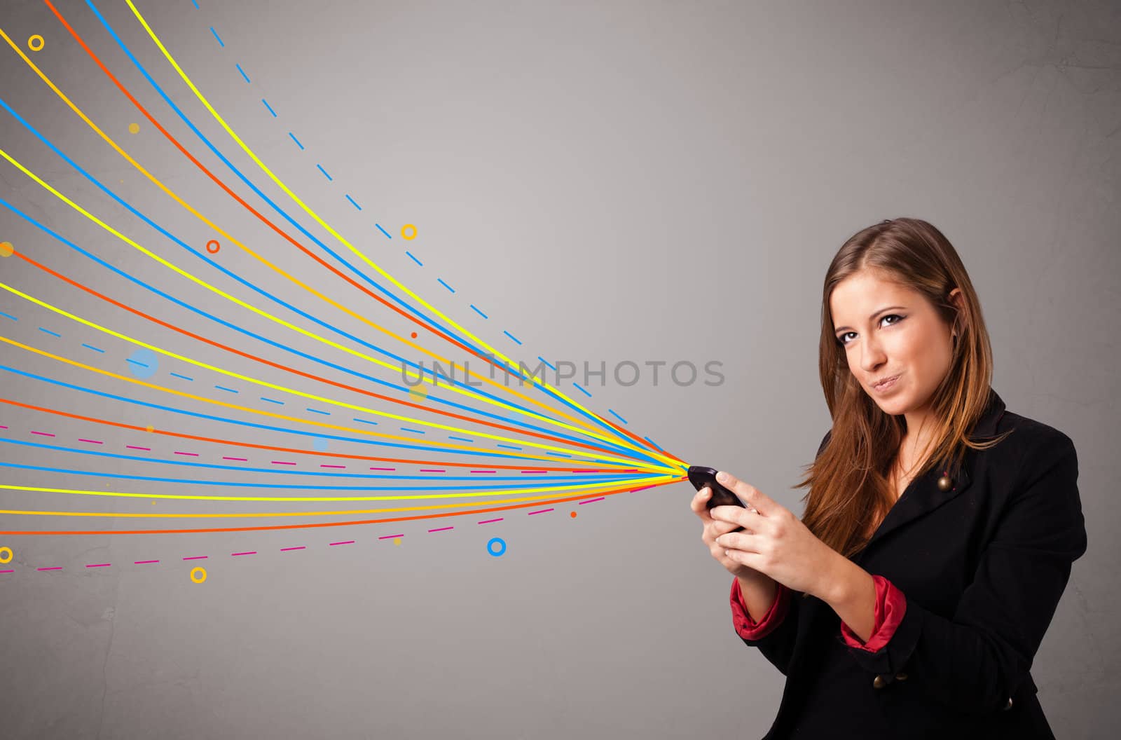 Happy young girl holding a phone with colorful abstract lines