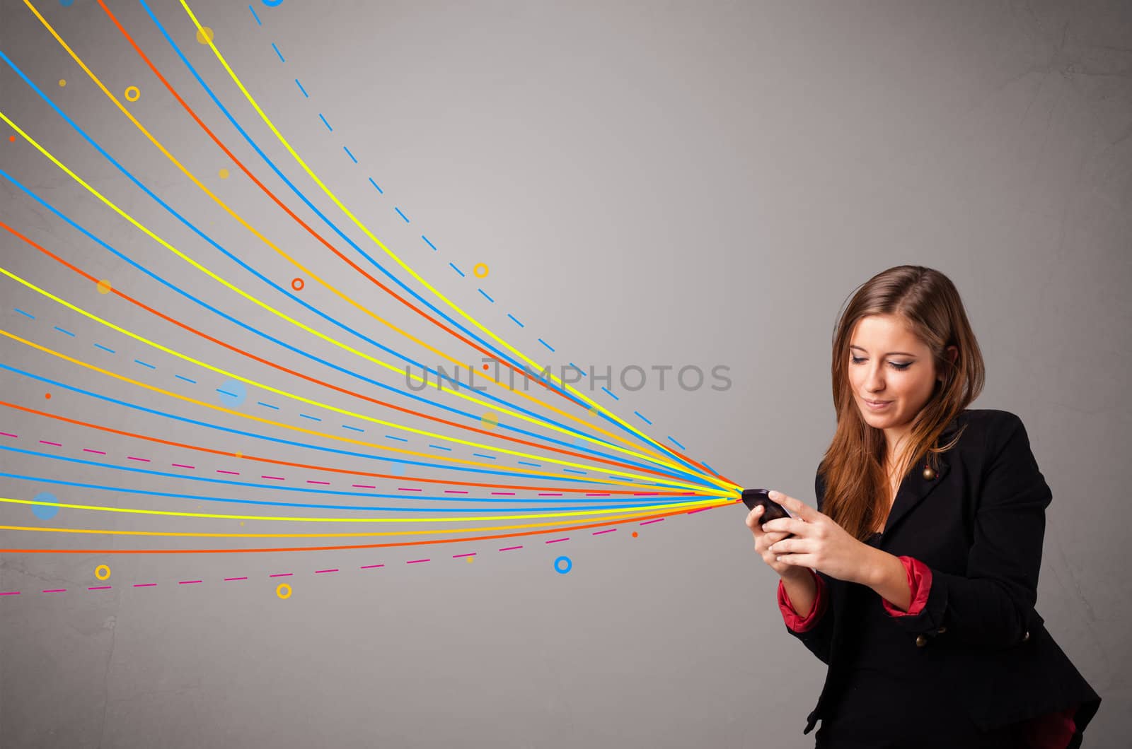 Happy young girl holding a phone with colorful abstract lines