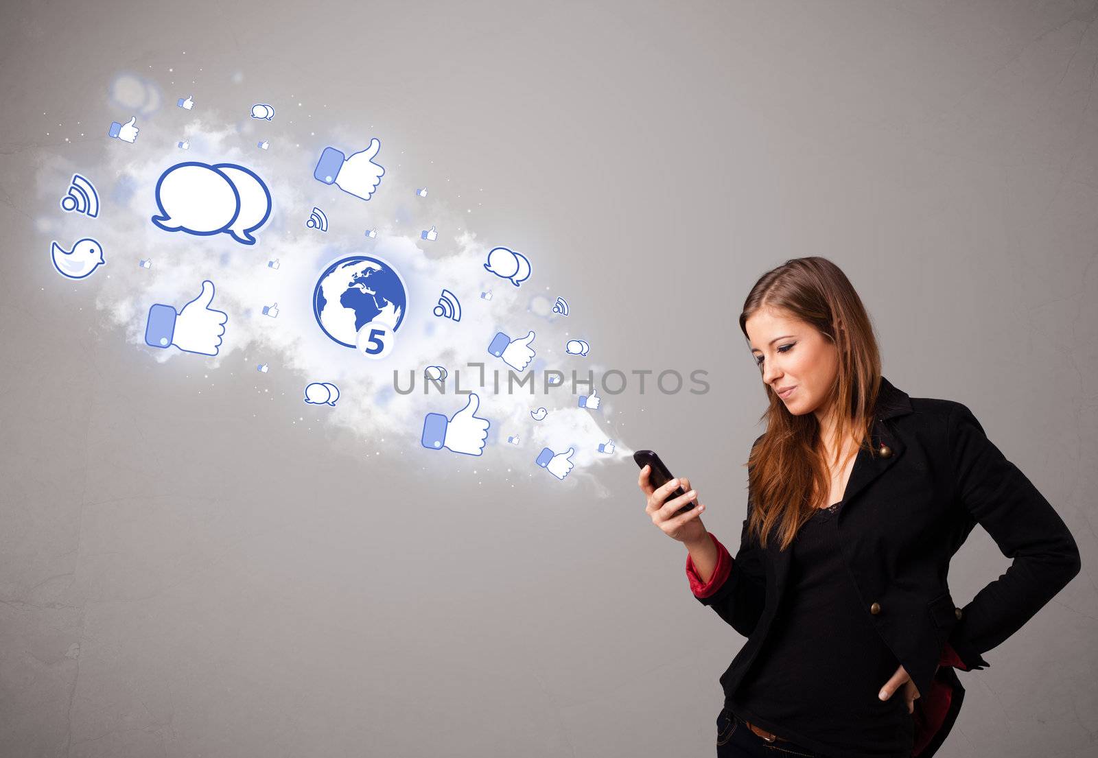 Pretty young girl holding a phone with social media icons by ra2studio