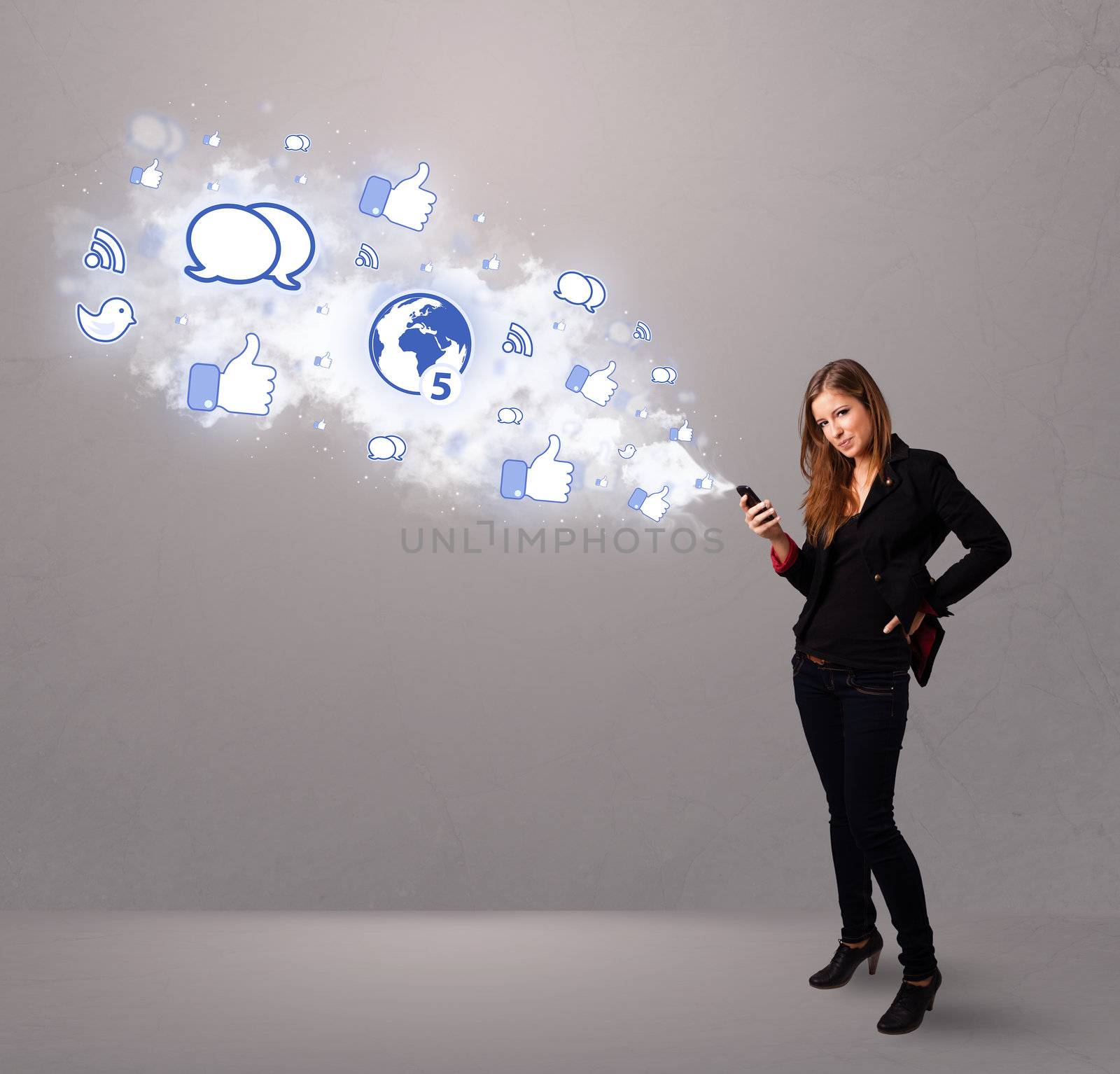 Pretty young girl holding a phone with social media icons by ra2studio