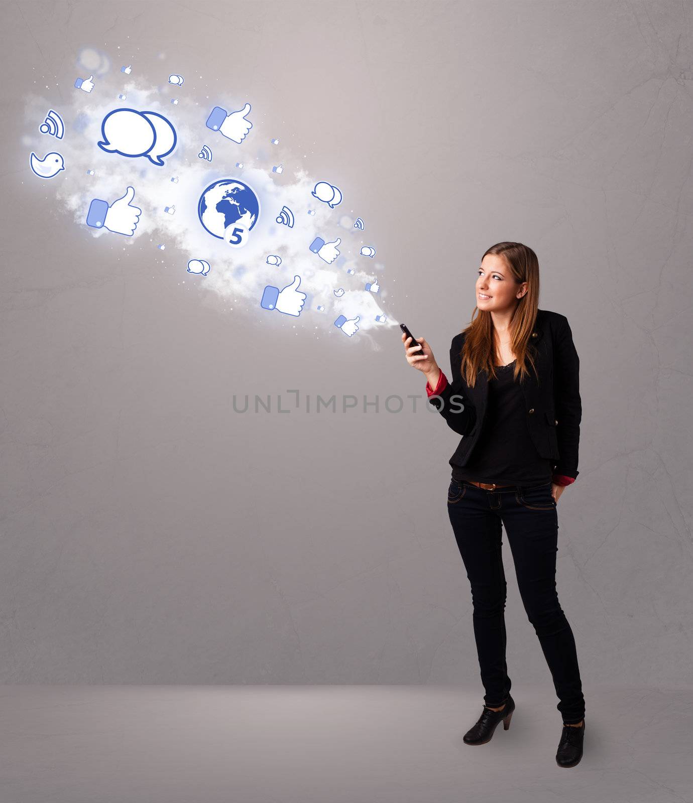 Pretty young girl holding a phone with social media icons by ra2studio