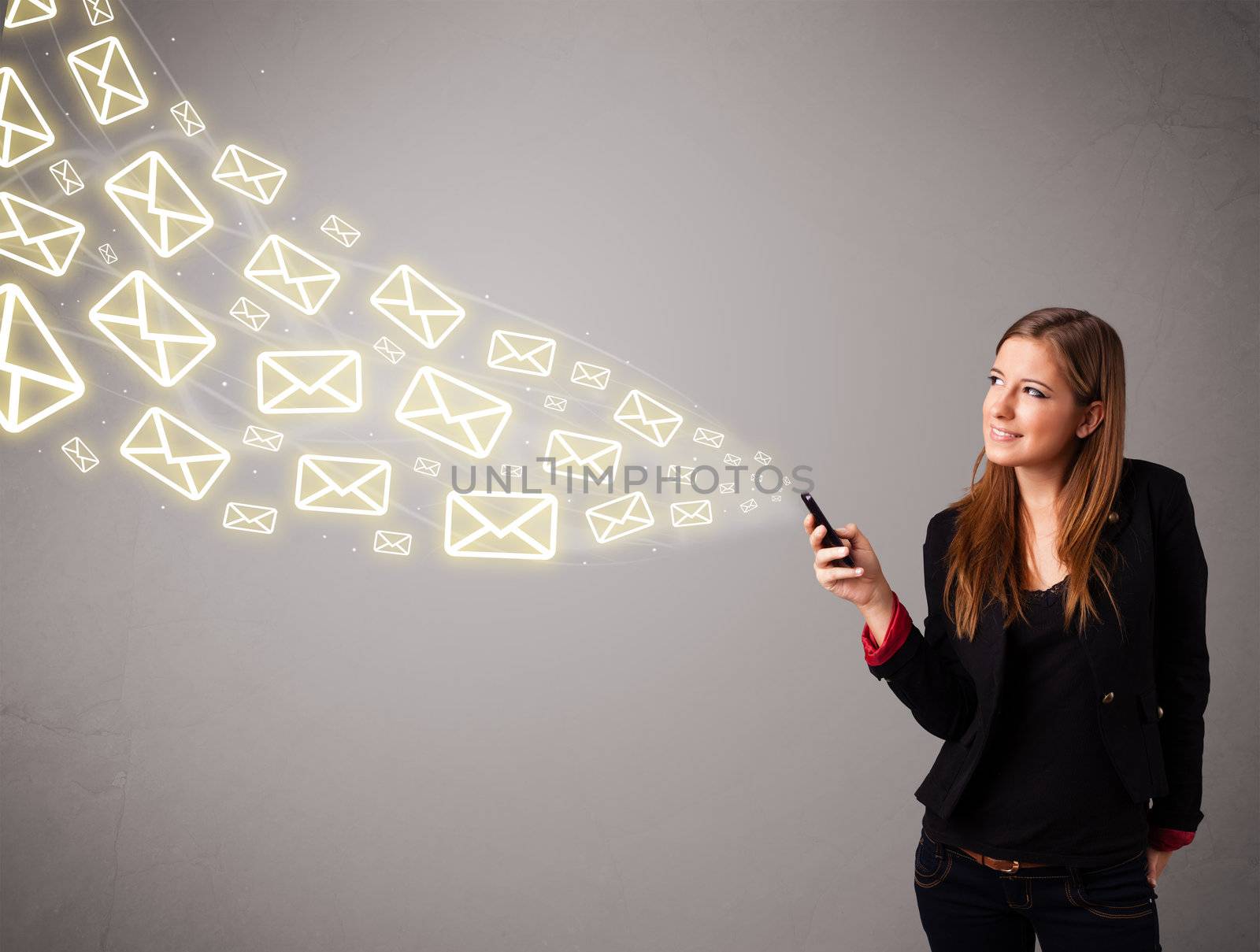 attractive young lady standing and holding a phone with message icons