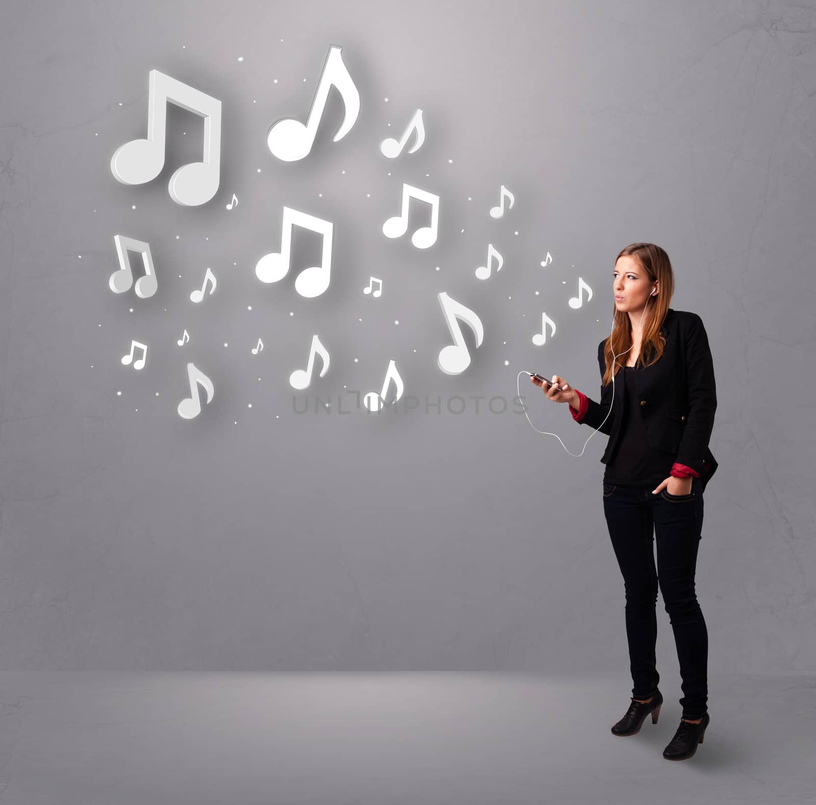 Pretty young woman singing and listening to music with musical notes getting out of her mouth