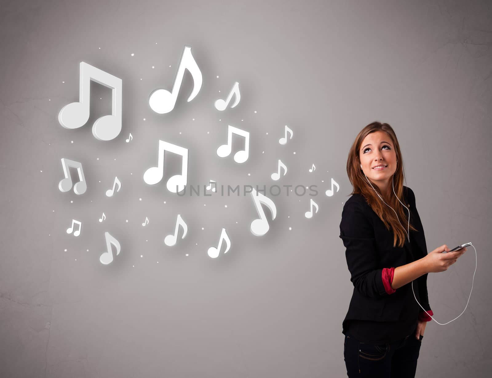 Pretty young woman singing and listening to music with musical notes getting out of her mouth