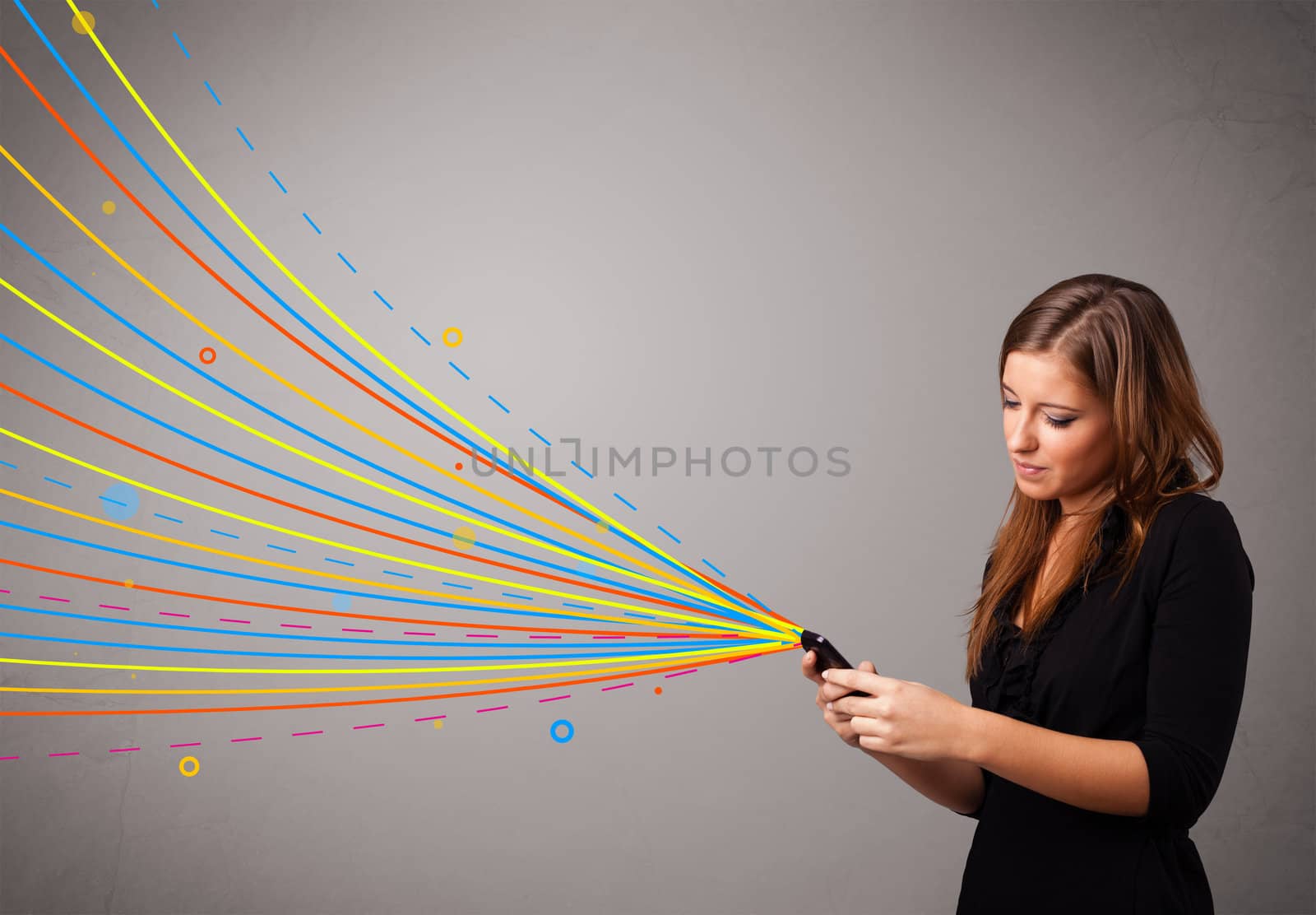 Happy young girl holding a phone with colorful abstract lines