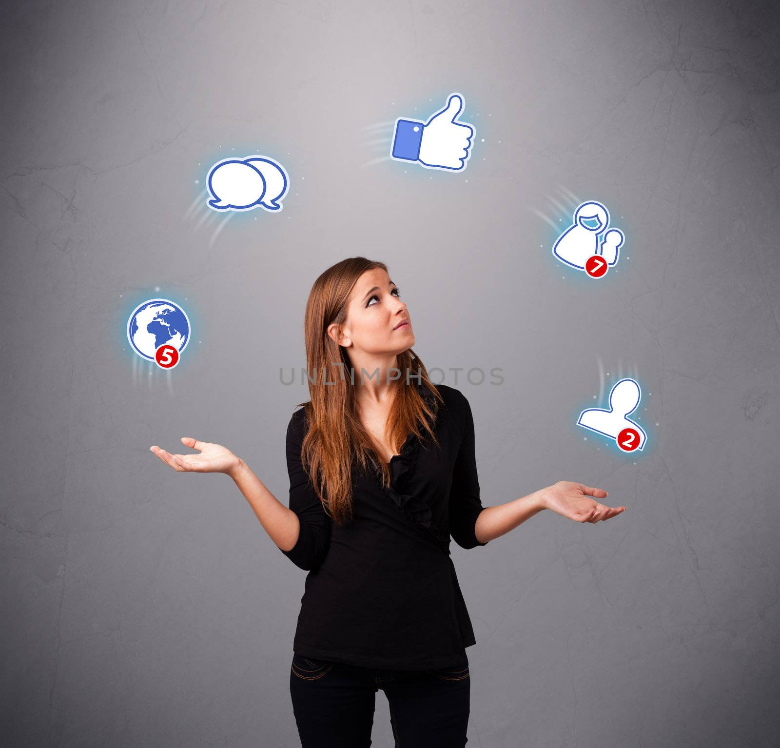 attractive young woman standing and juggling with social network icons