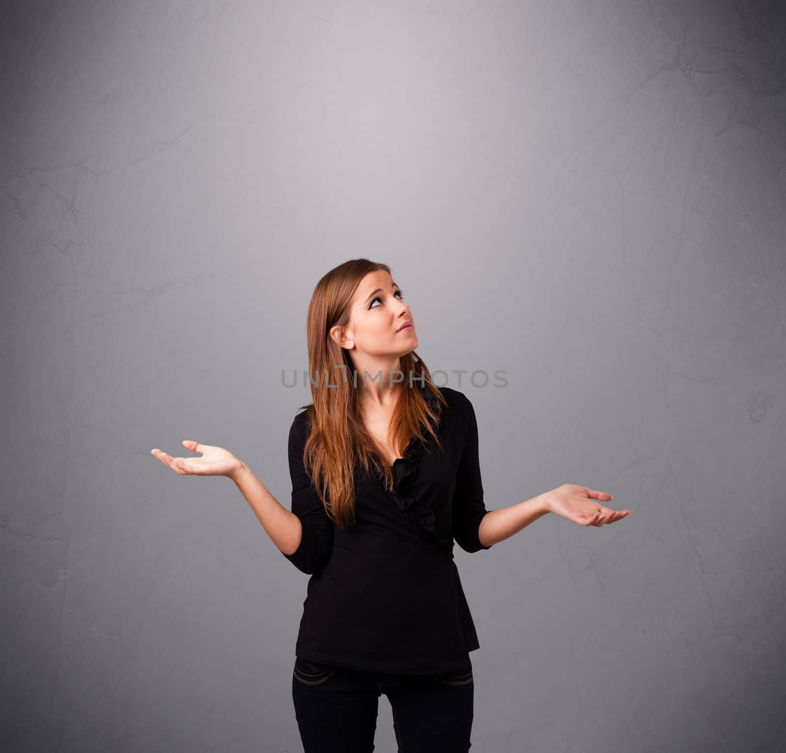 beautiful young lady standing and juggling with copy space