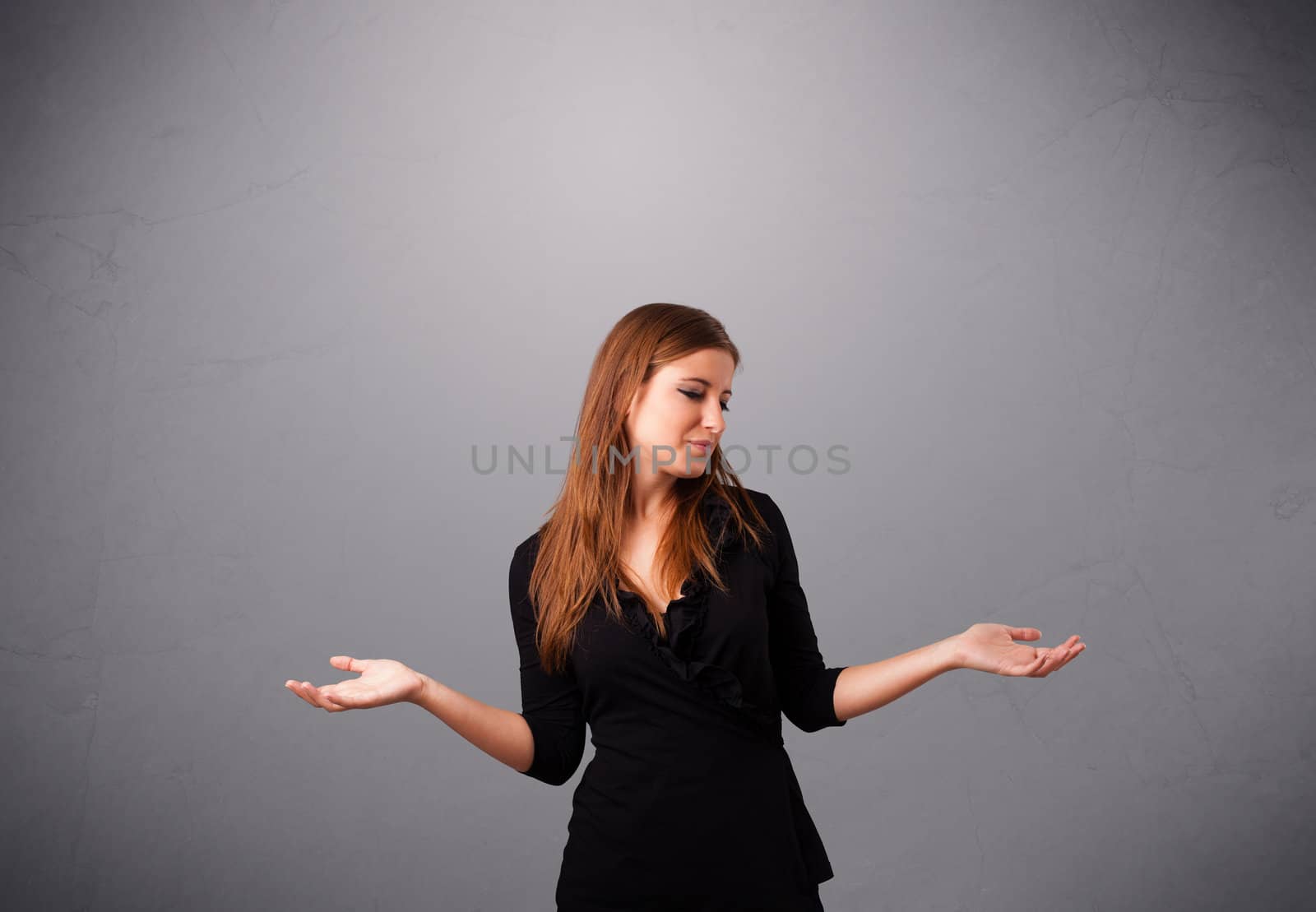beautiful young lady standing and juggling with copy space