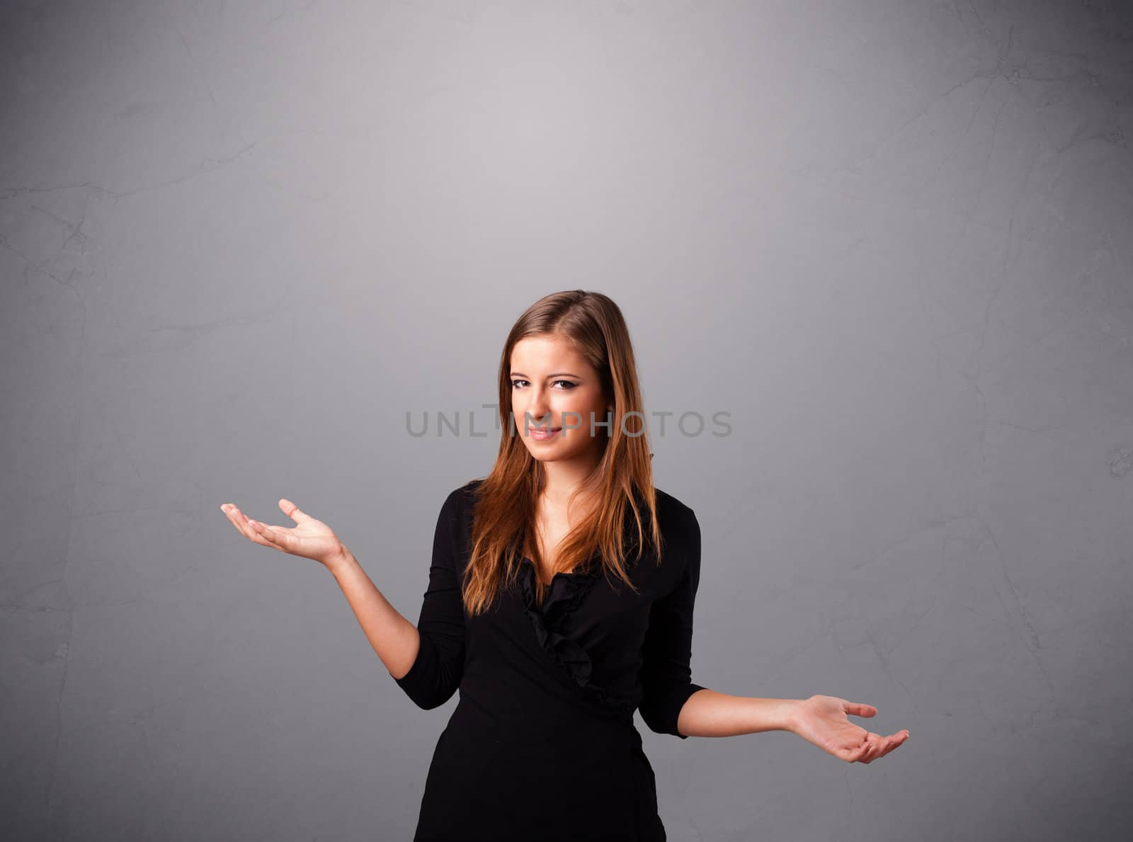 beautiful young lady standing and juggling with copy space