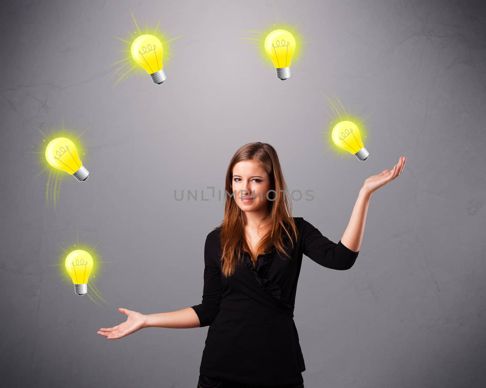 young lady standing and juggling with light bulbs by ra2studio