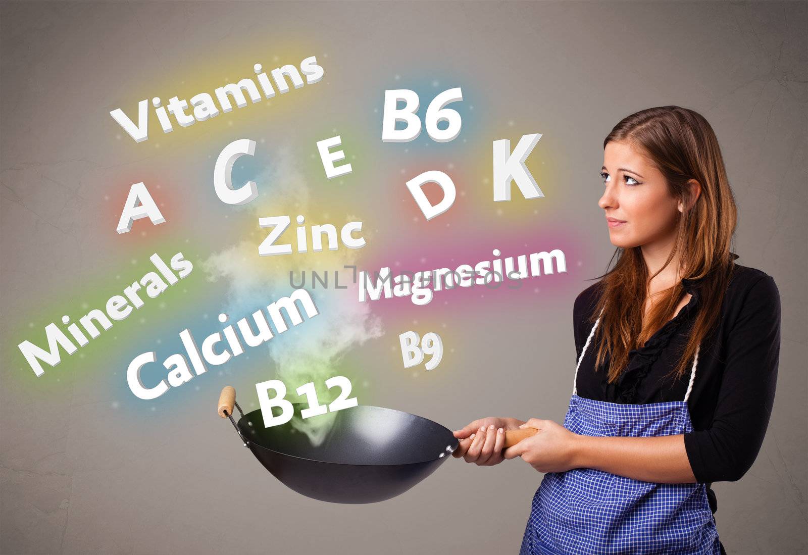 Pretty young woman cooking vitamins and minerals